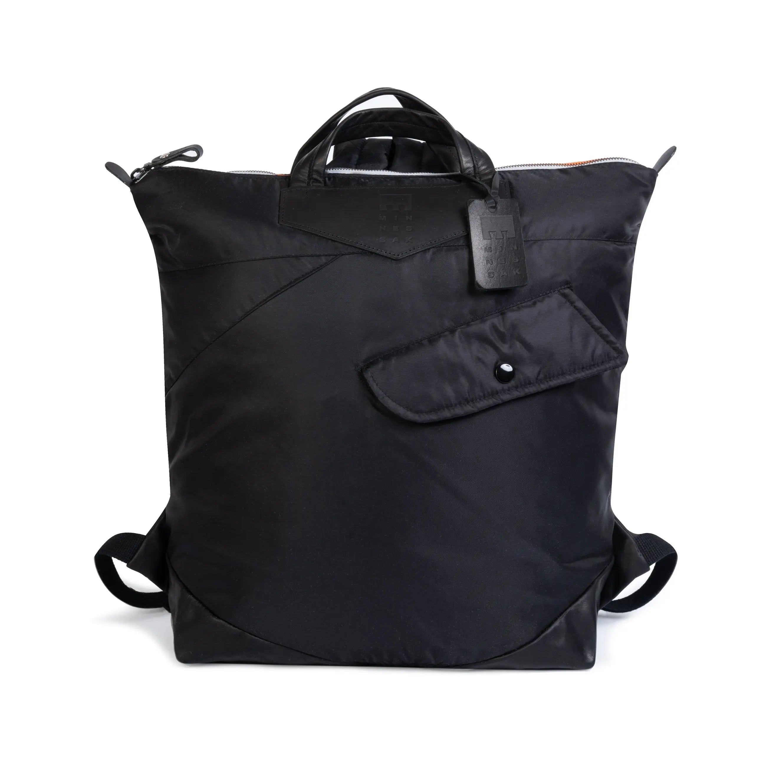 Black backpack with a visible brand tag on a white background