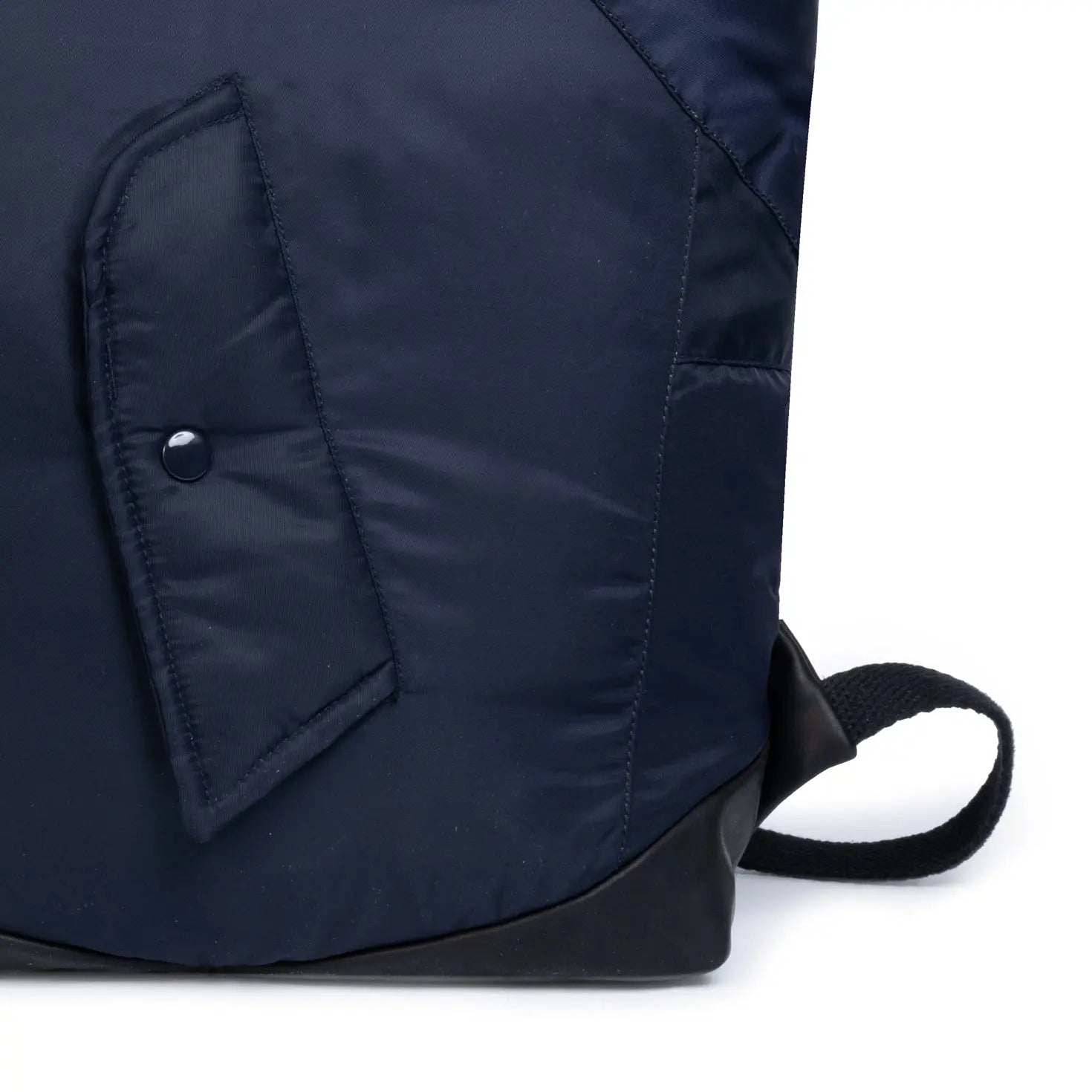 Navy blue backpack with a button detail on a white background