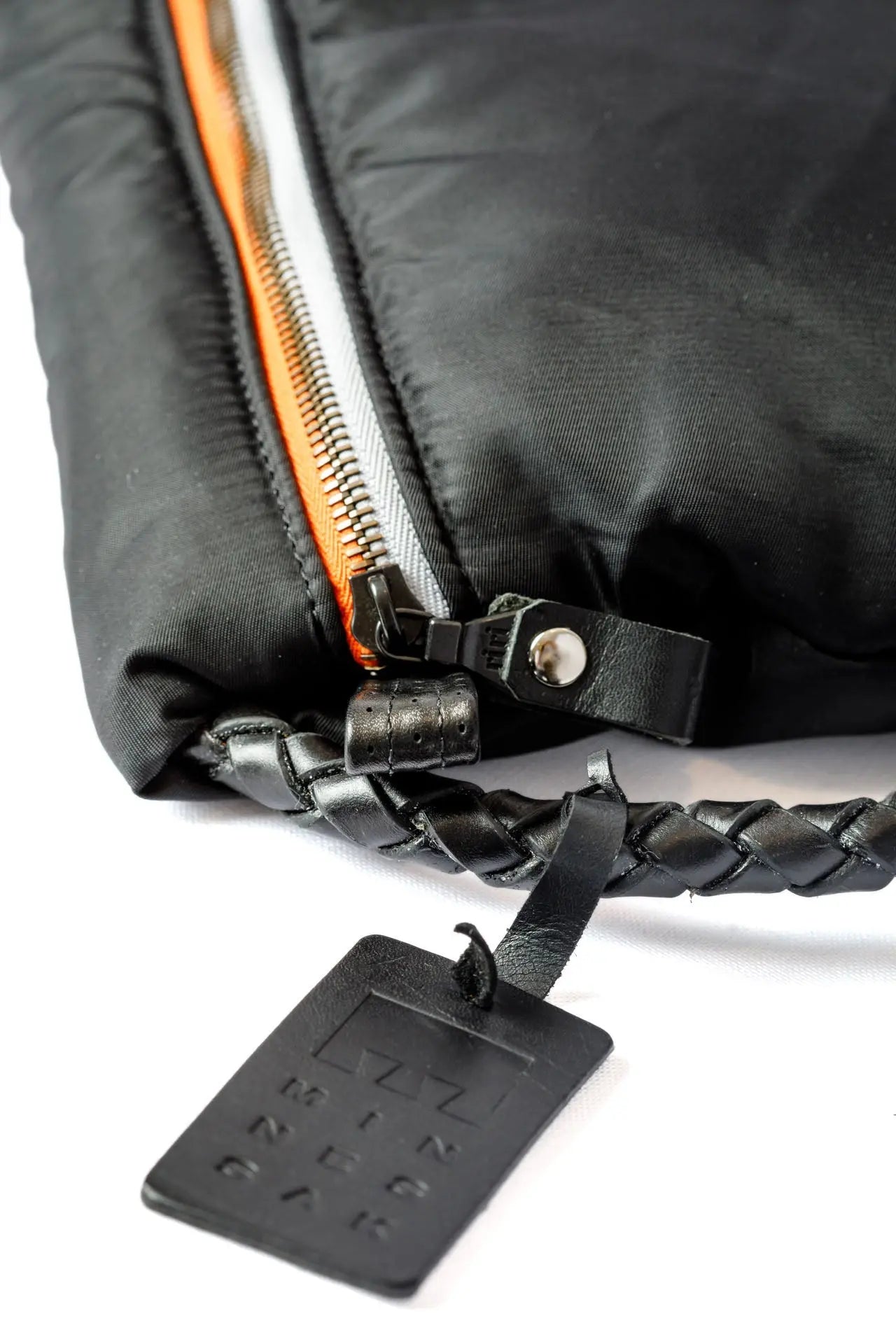 Black Lap It Up Corded zip side with straped logo on a white background