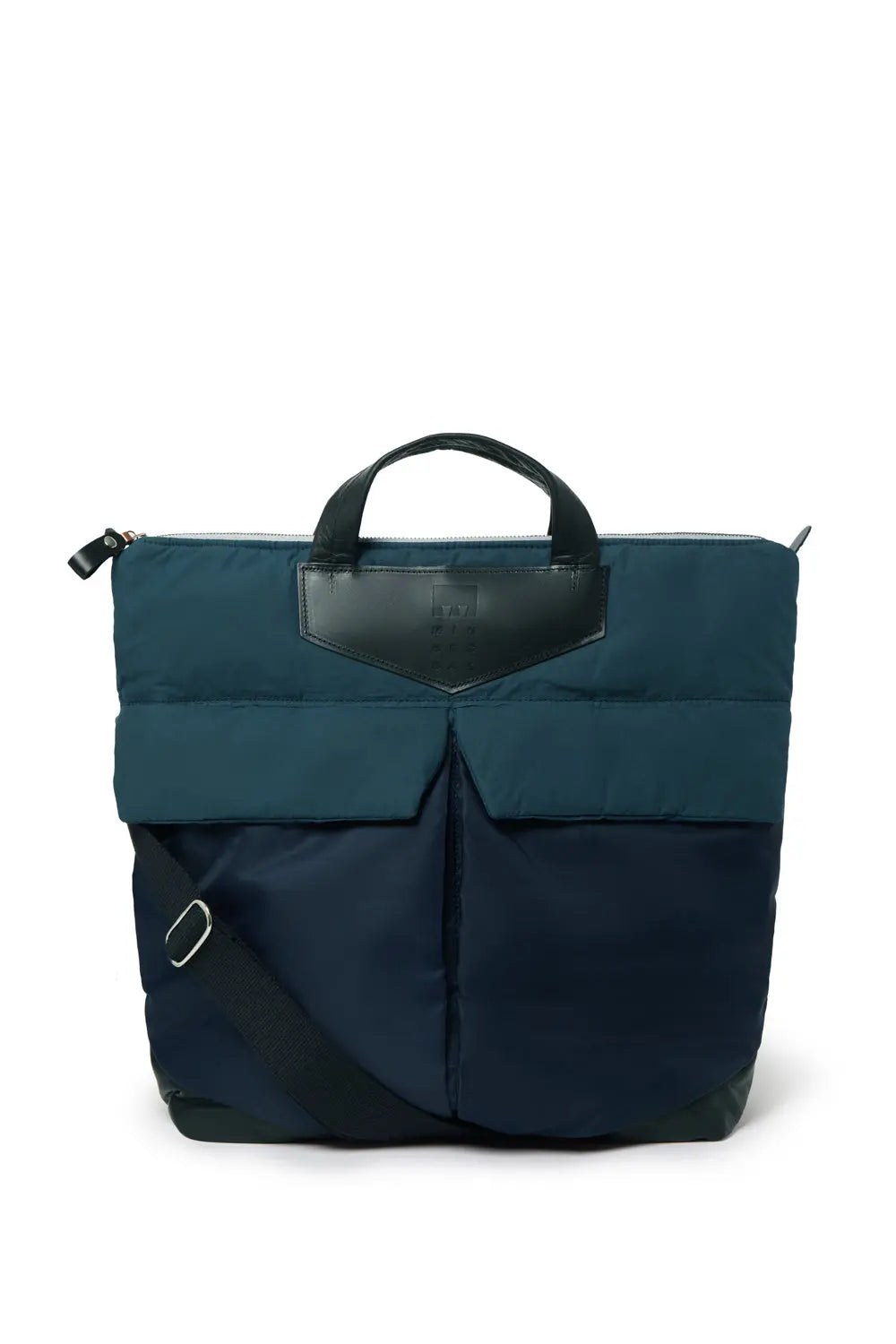 Navy backpack with a leather patch on a white background