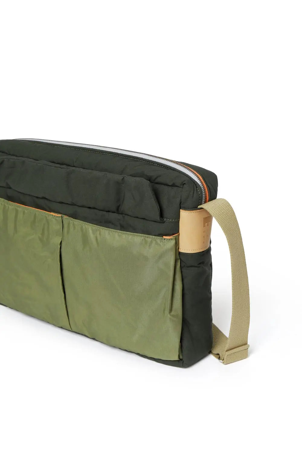 Green and gray bag with a beige handle on a white background