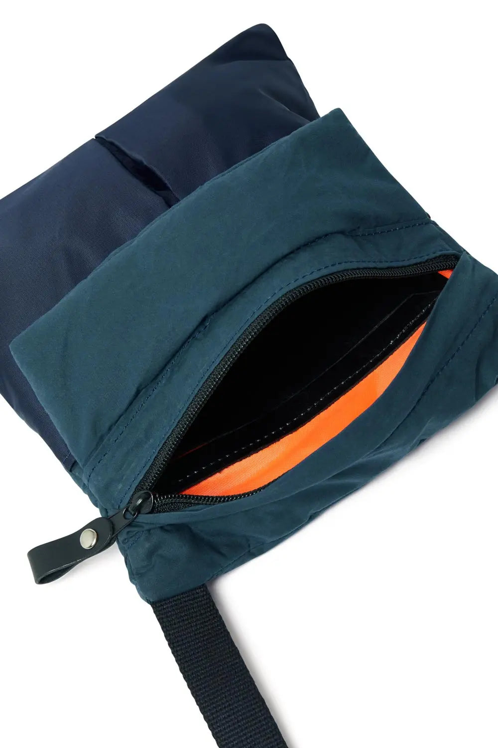 Two blue bags with a visible zipper on a white background