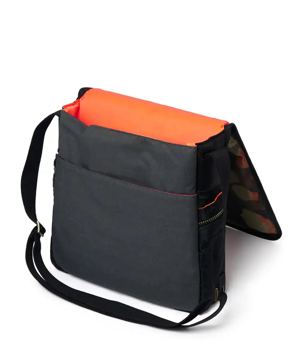 Black and orange bag with a strap on a white background