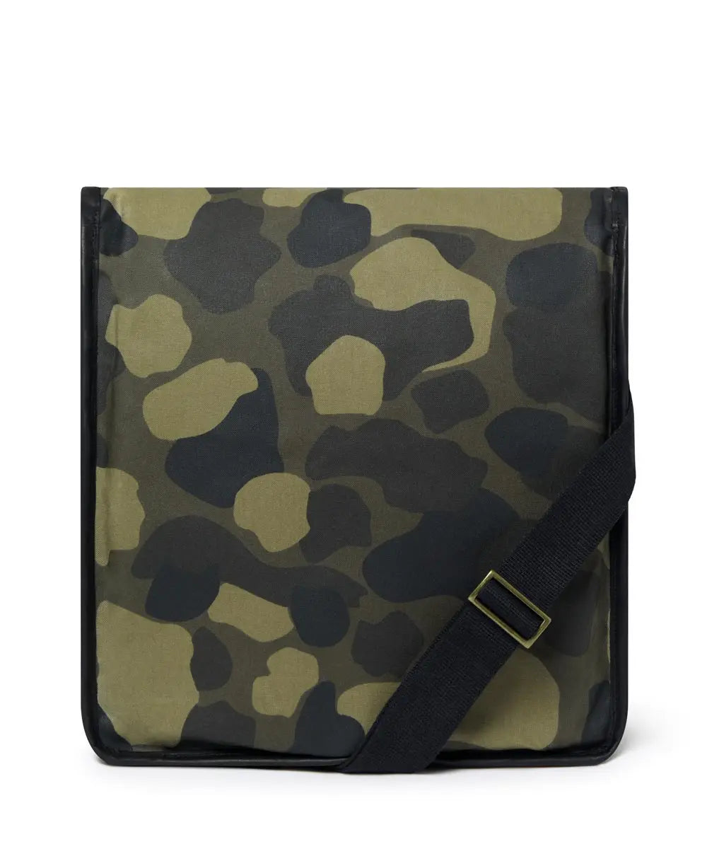 Camouflage-patterned bag with a black strap on a white background