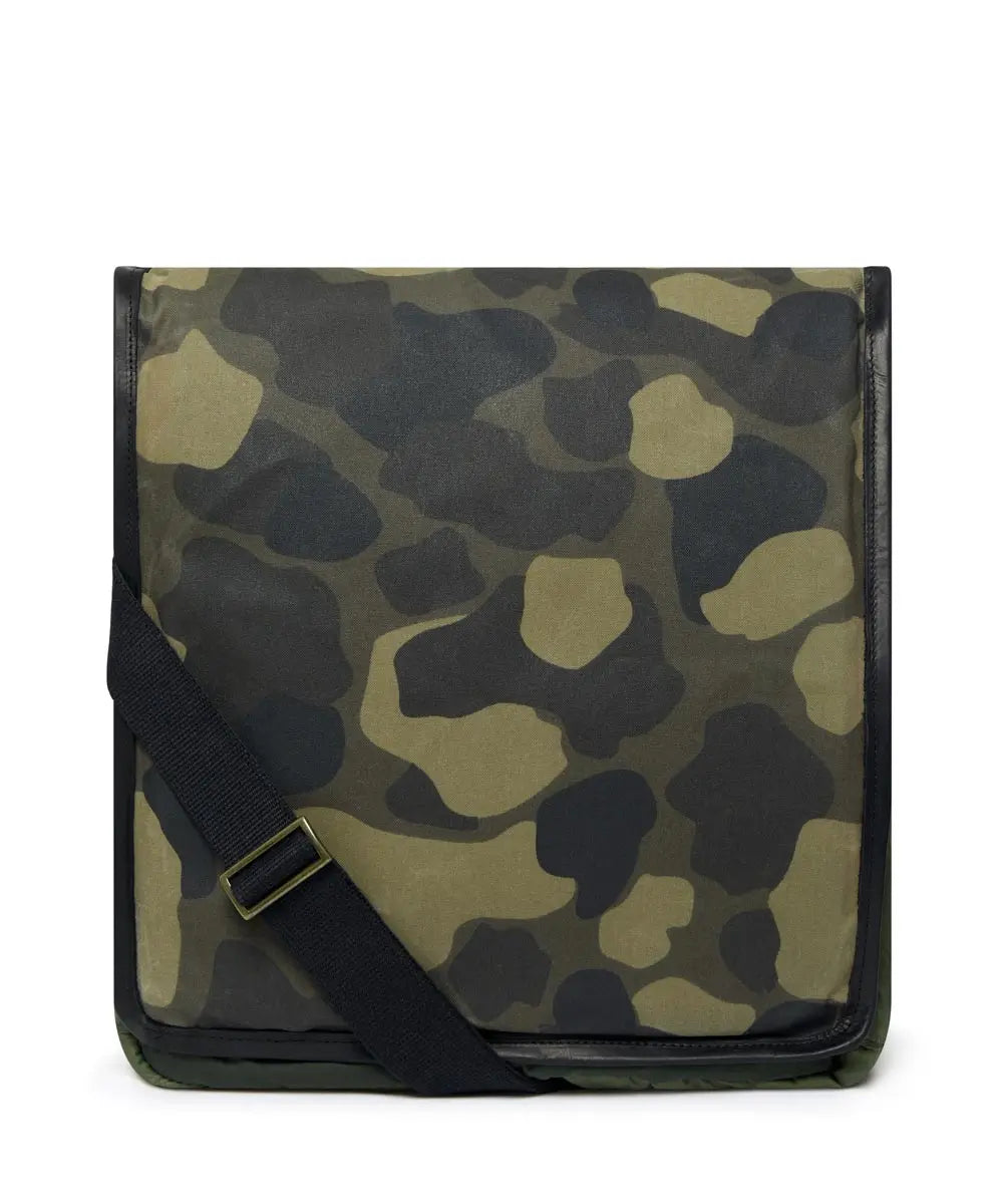 Camouflage-patterned bag with a black strap on a white background