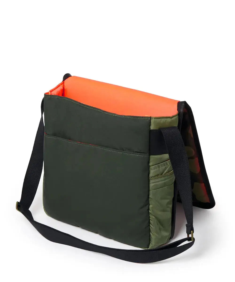 Multicolored bag with Olive, orange, and black sections on a white background