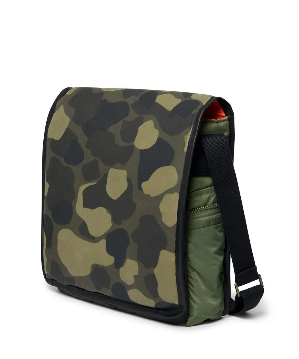 Camouflage-patterned bag with a visible brand logo on a white background