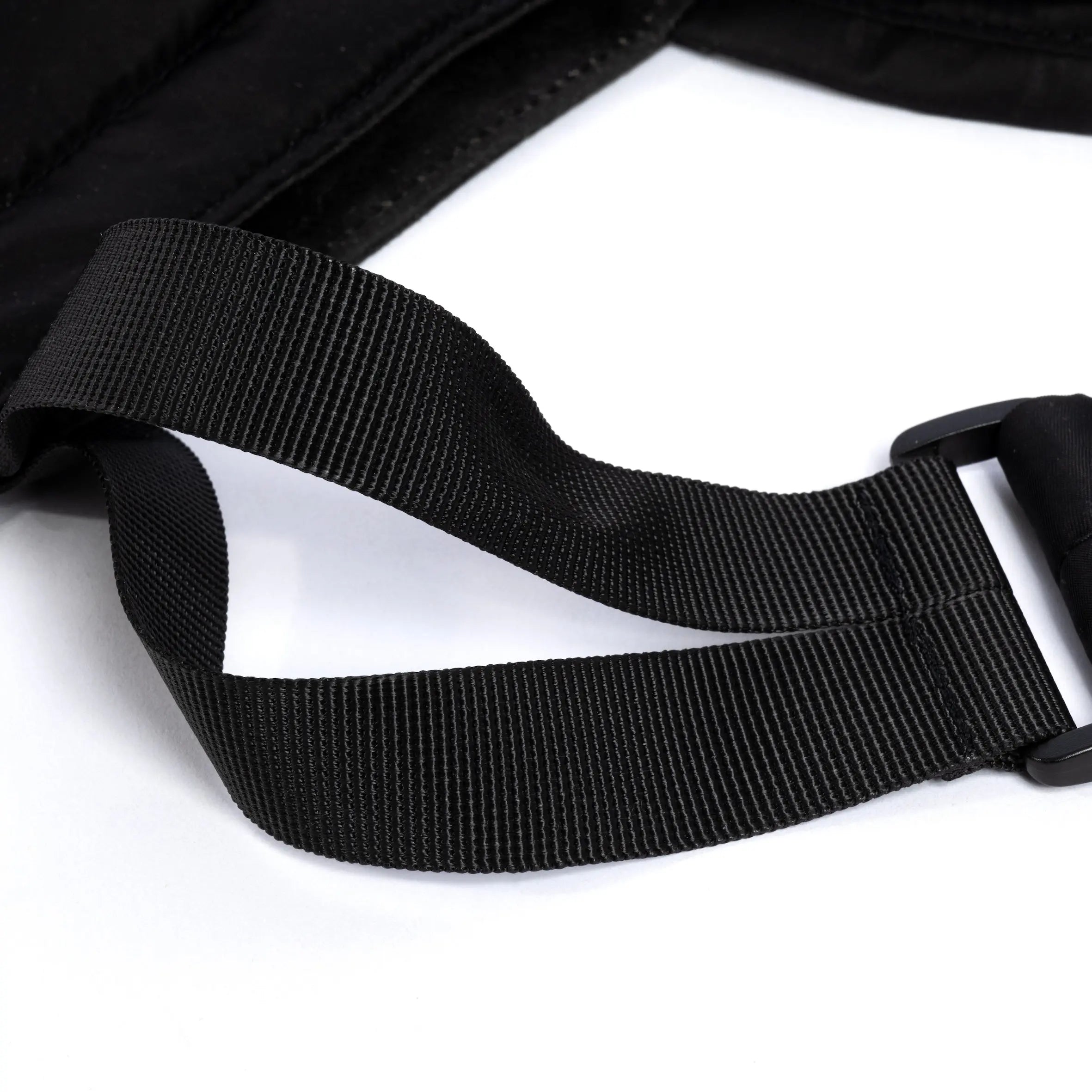 Black medium size tote bag showing strap detail on white background