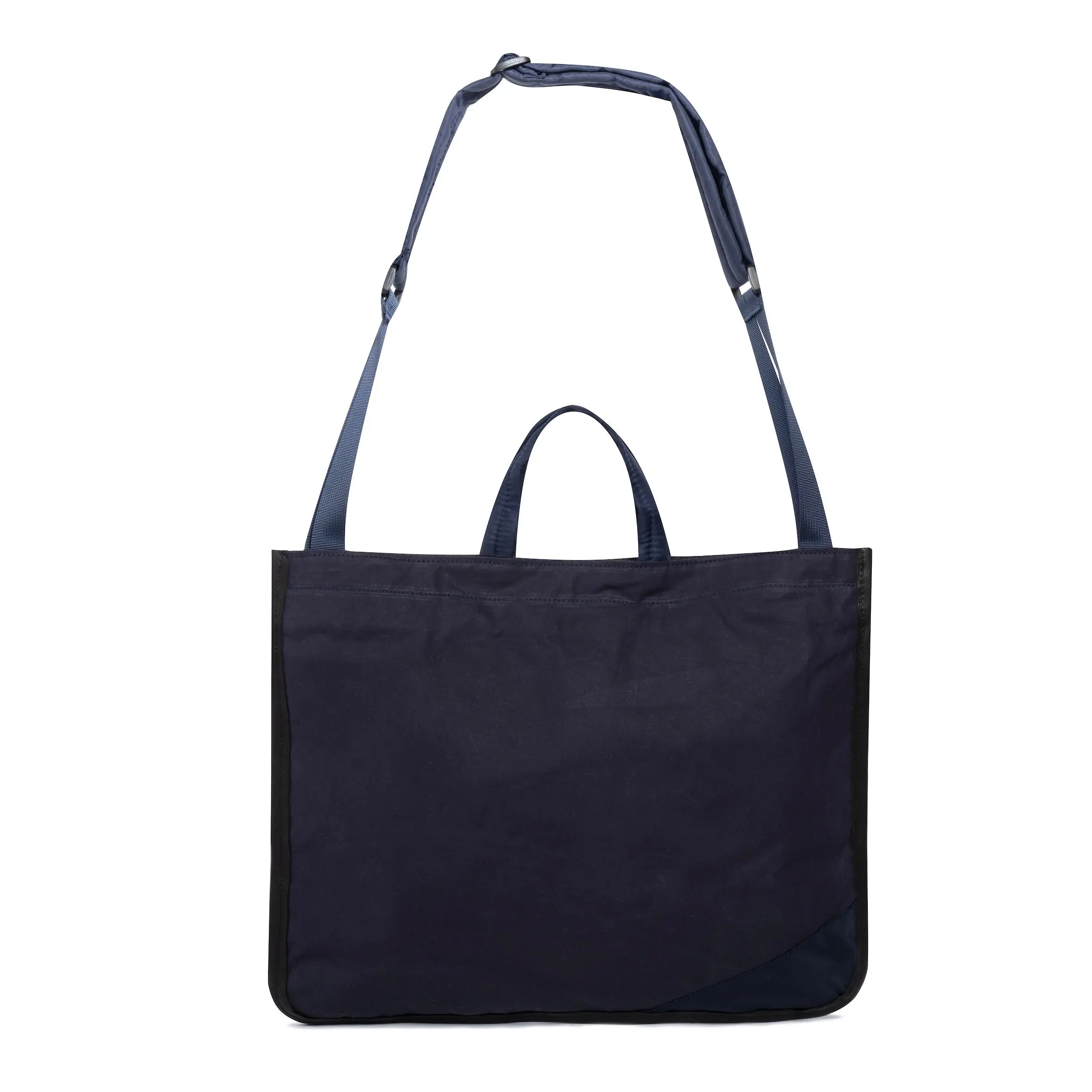 Navy blue medium size tote bag with shoulder strap and Minnessak logo on white background