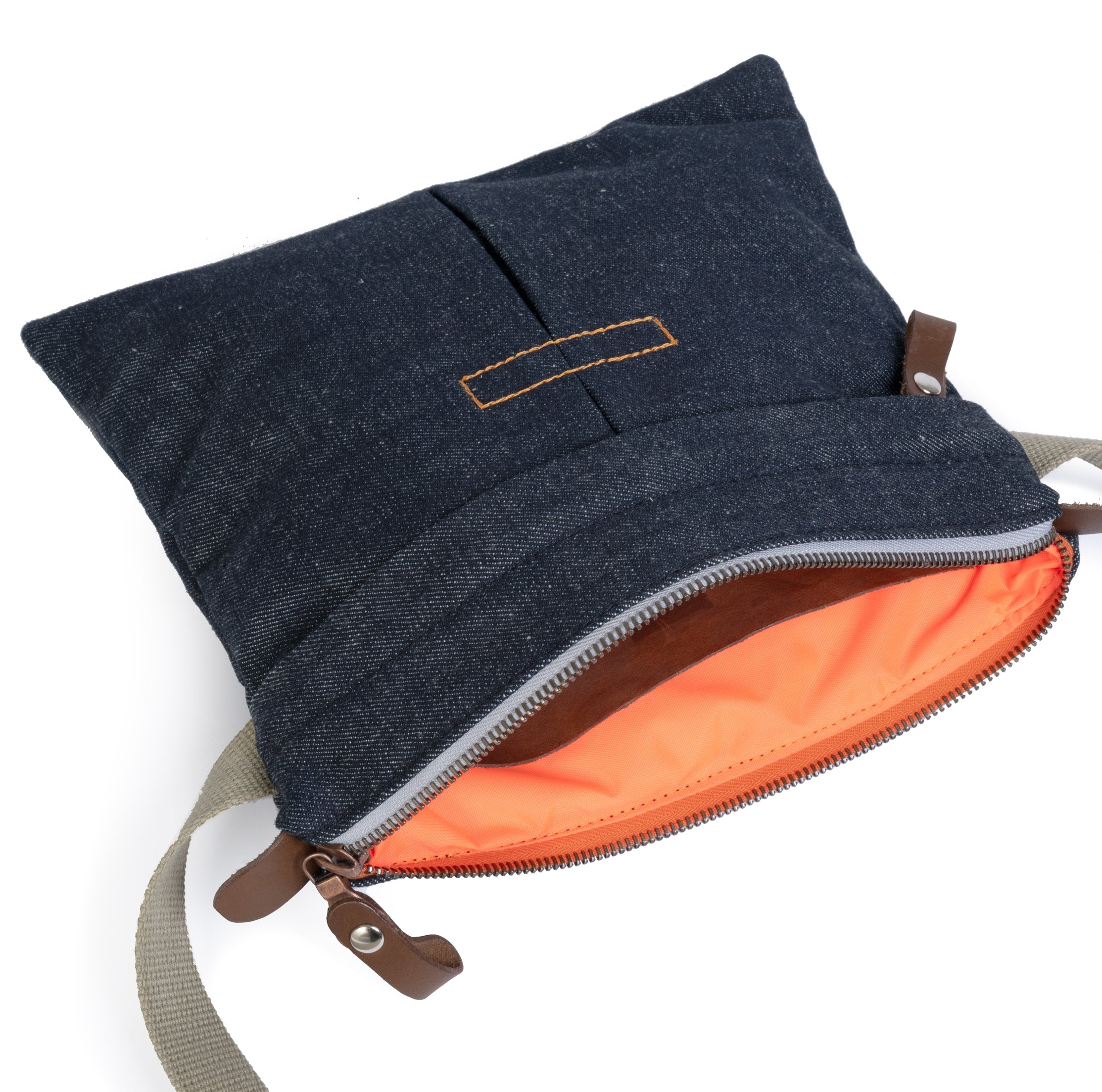 Blue denim pouch with orange interior on a white background