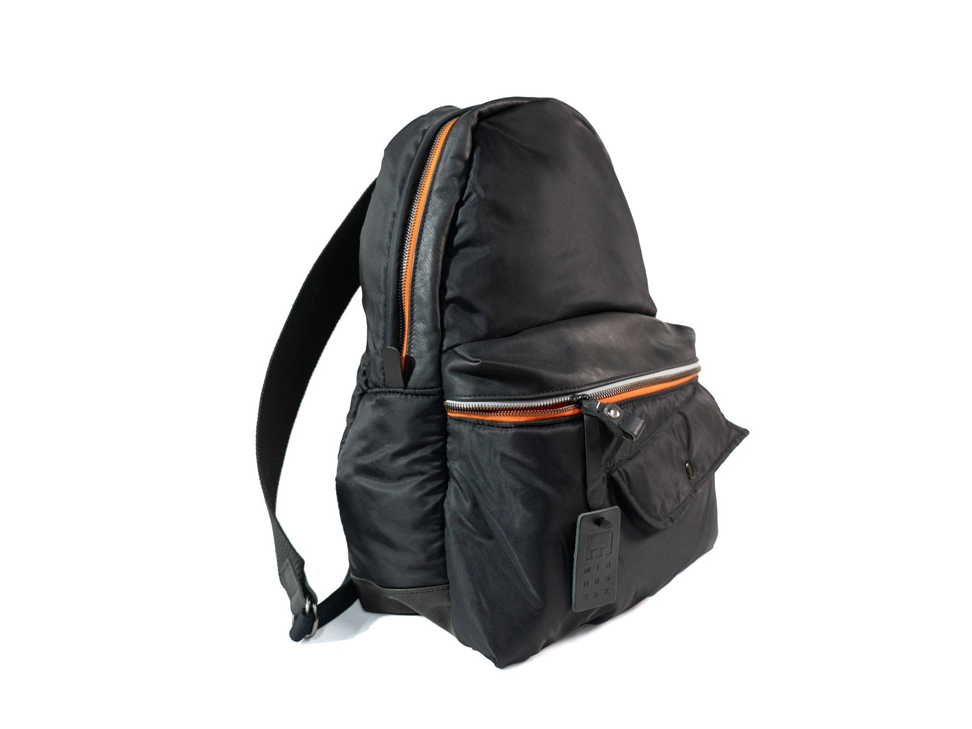 Black backpack with orange zippers on a white background