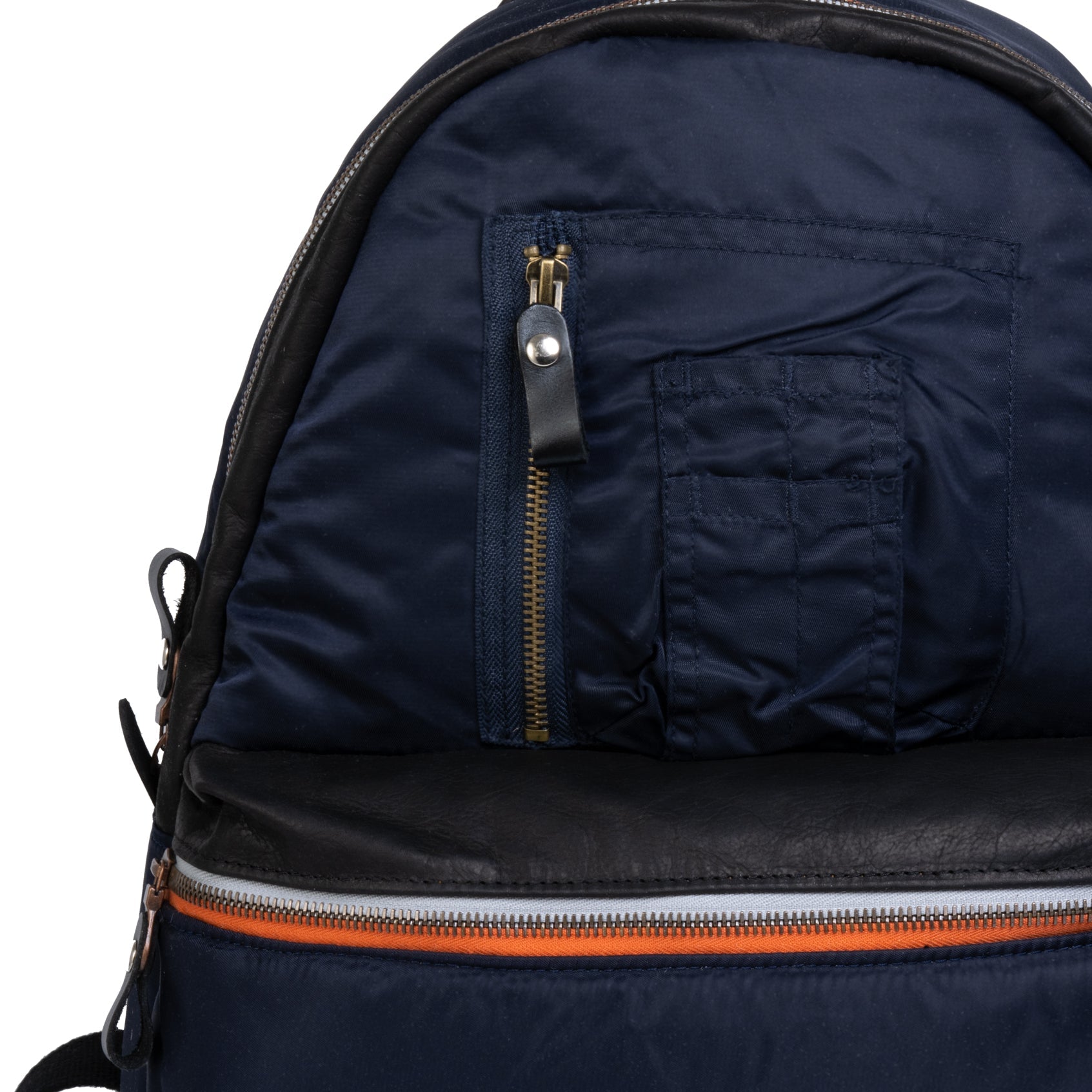 Navy blue backpack with zippers and orange trim on a white background