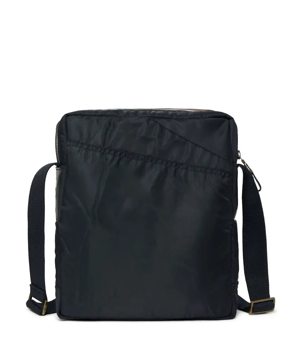 Black backpack with straps on a white background