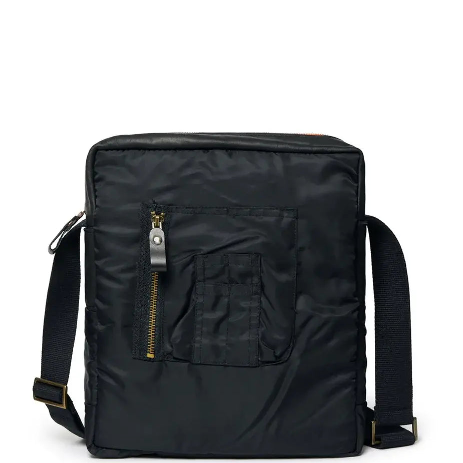 Black backpack with a strap and a front pocket and zipper on a white background