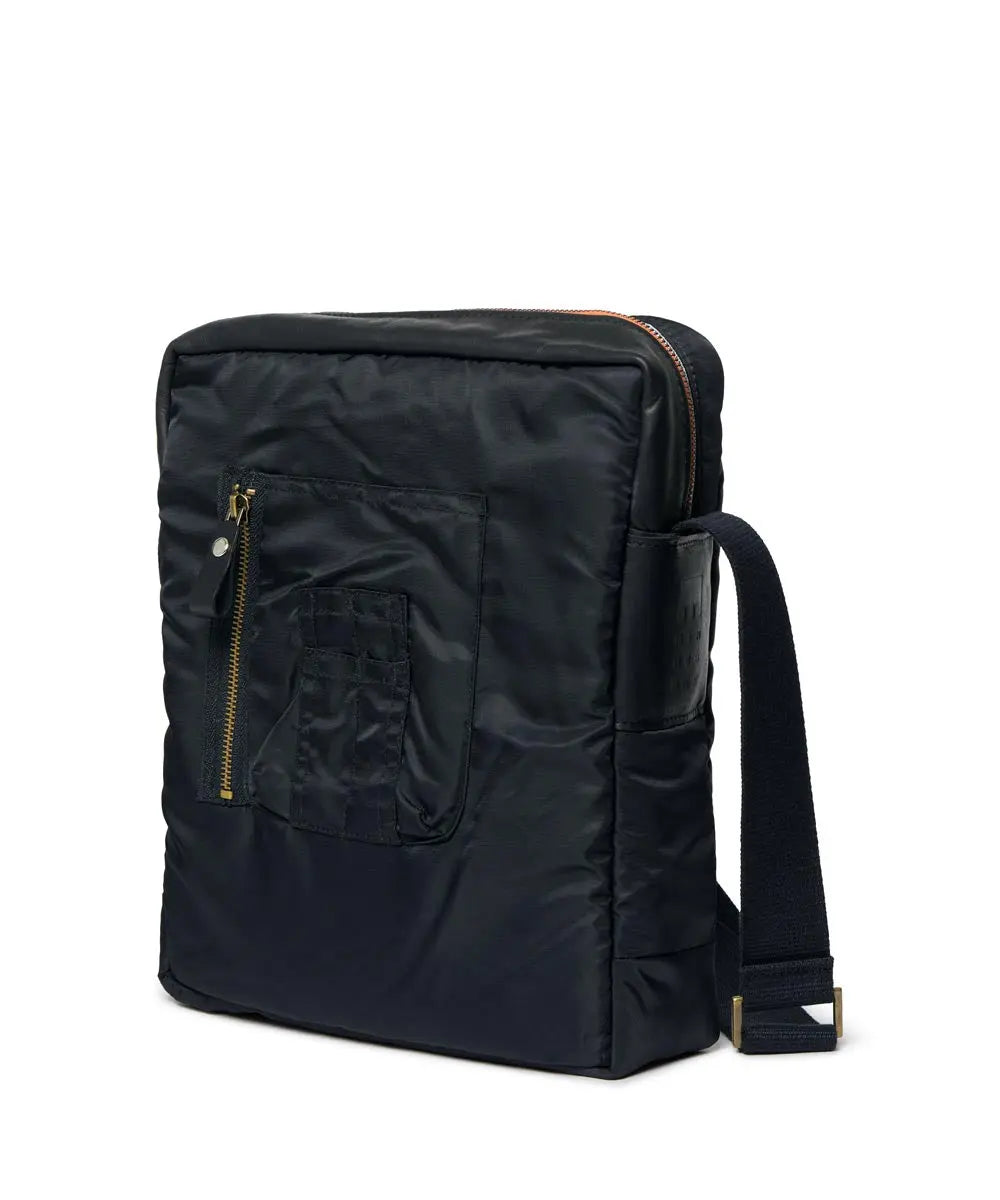 Black backpack with a visible brand logo on a white background