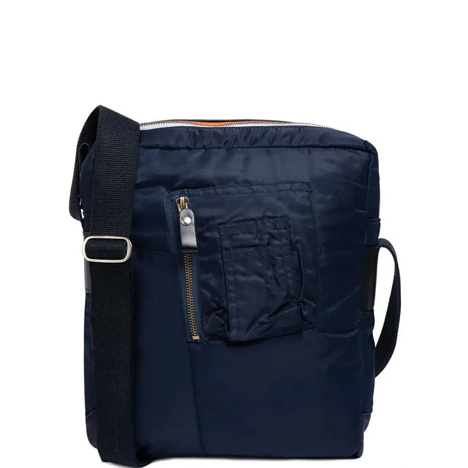 Navy blue backpack with a shoulder strap on a white background