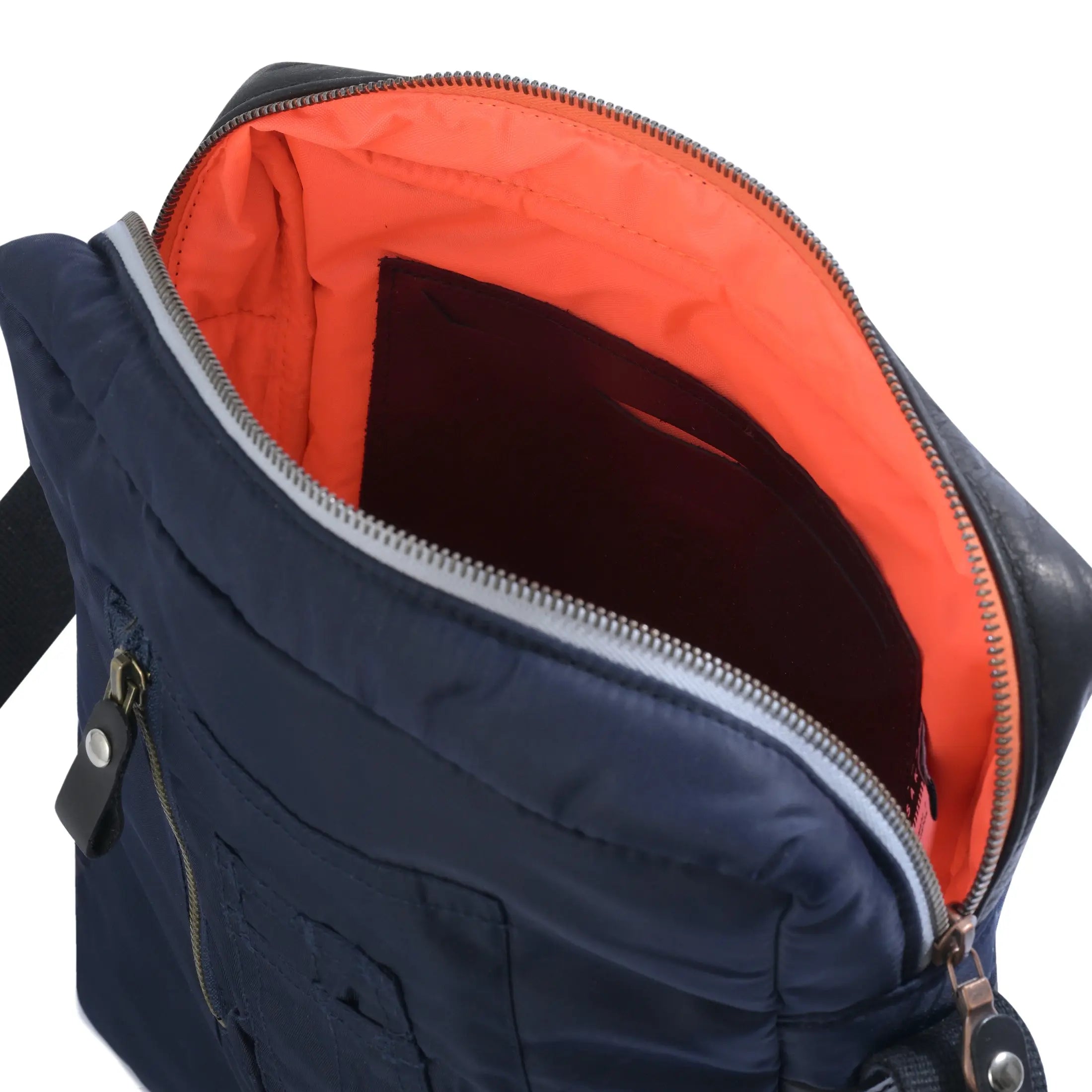 Navy blue backpack with orange interior on a white background