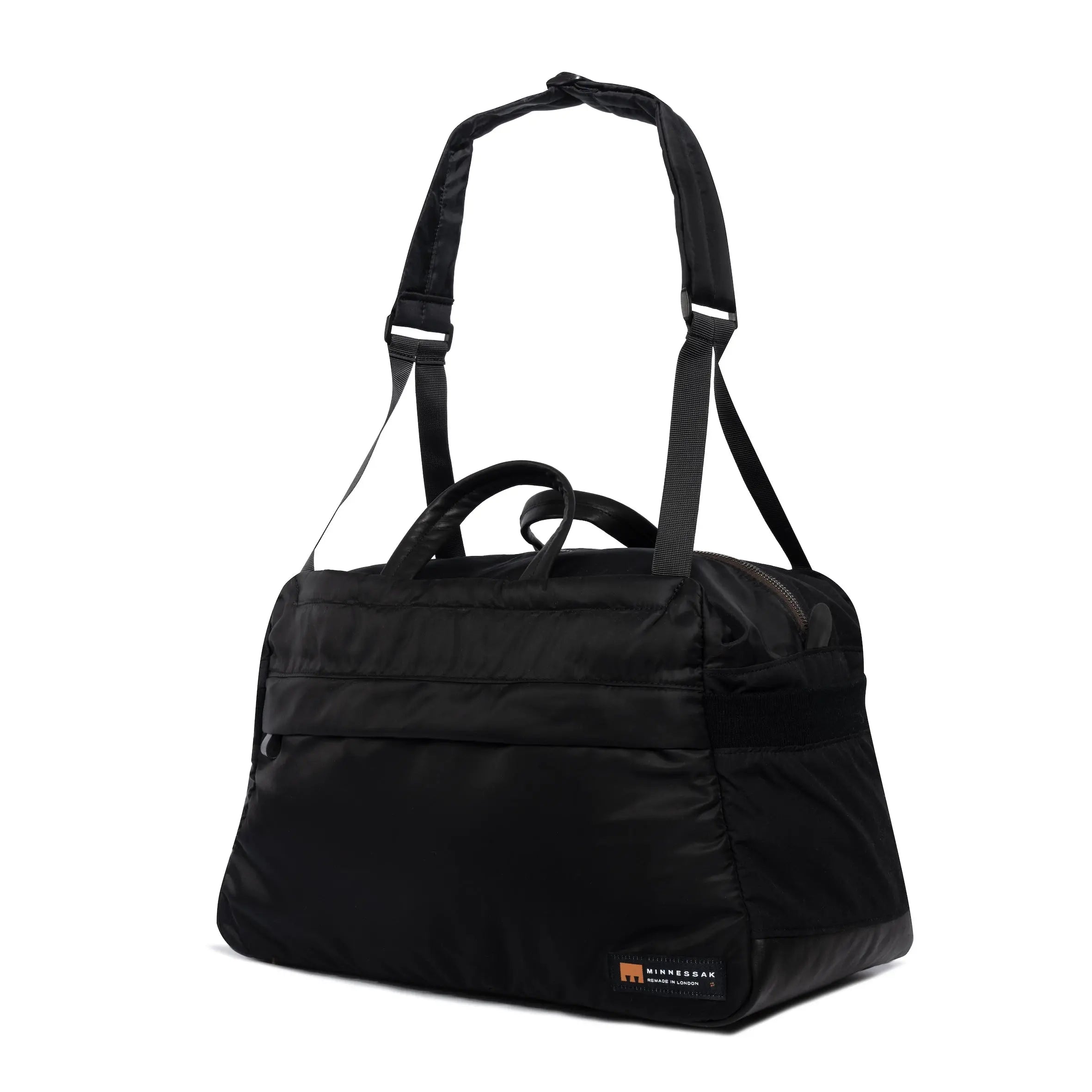 Black Weekender/Gym bag side view with strap and MInnessak logo on white background