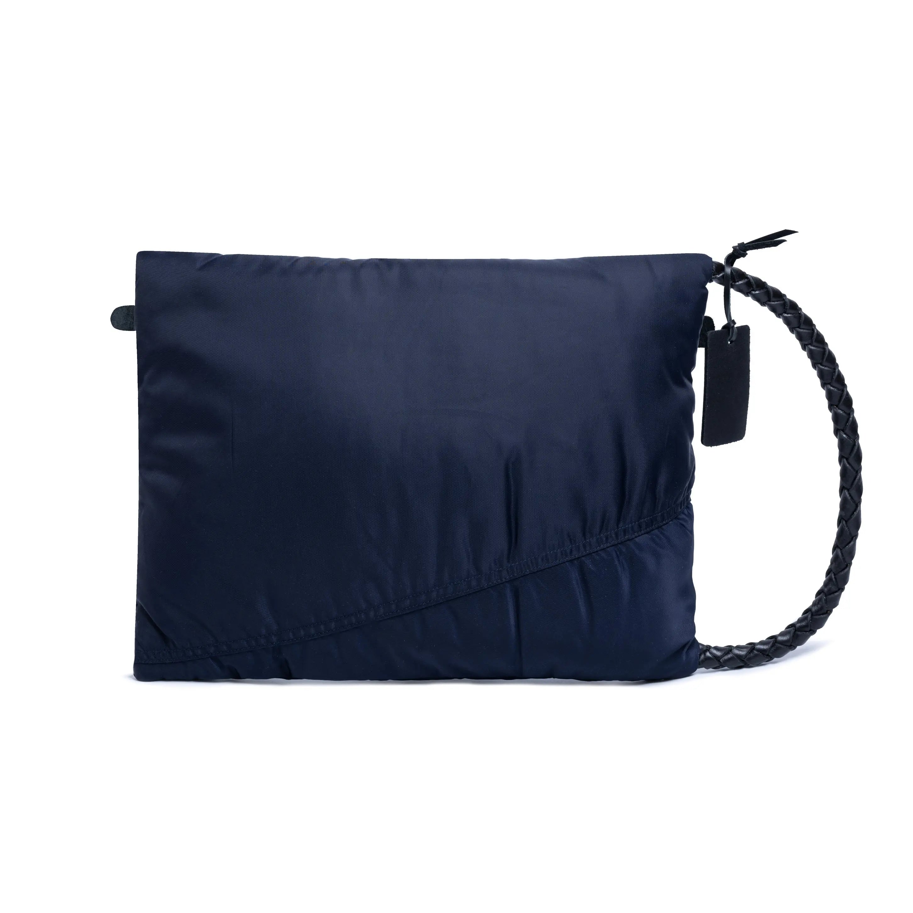 Navy blue pouch with a braided handle on a white background