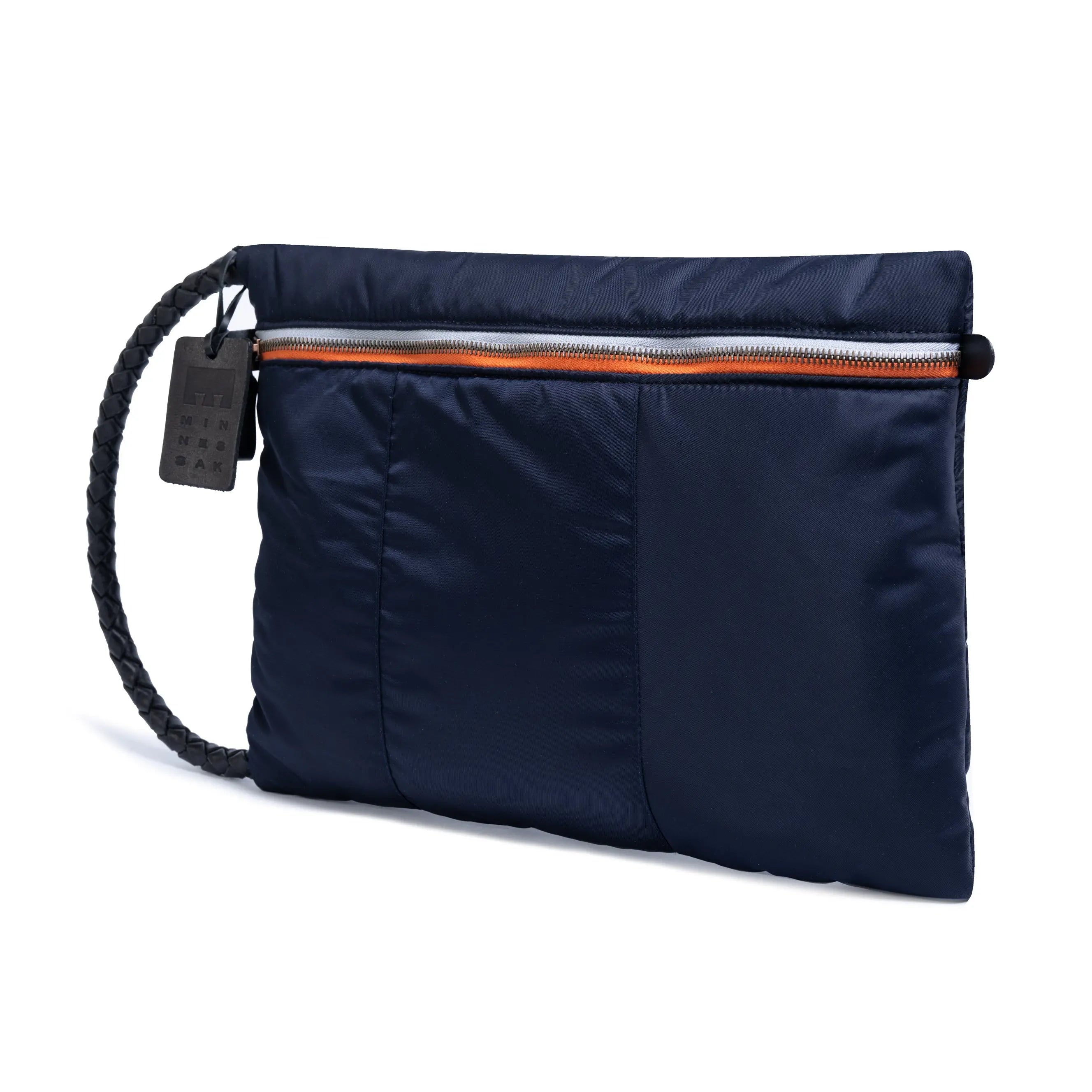 Navy blue crossbody bag with a strap on a white background