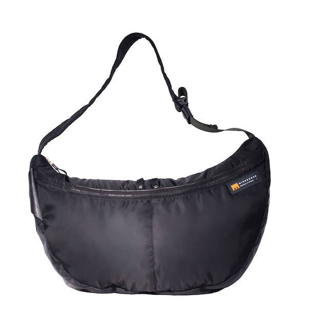 Black Boat Large, front, sustainable crossbody bag handmade from repurposed MA-1 flight jacket material with adjustable strap and two front zip pockets.