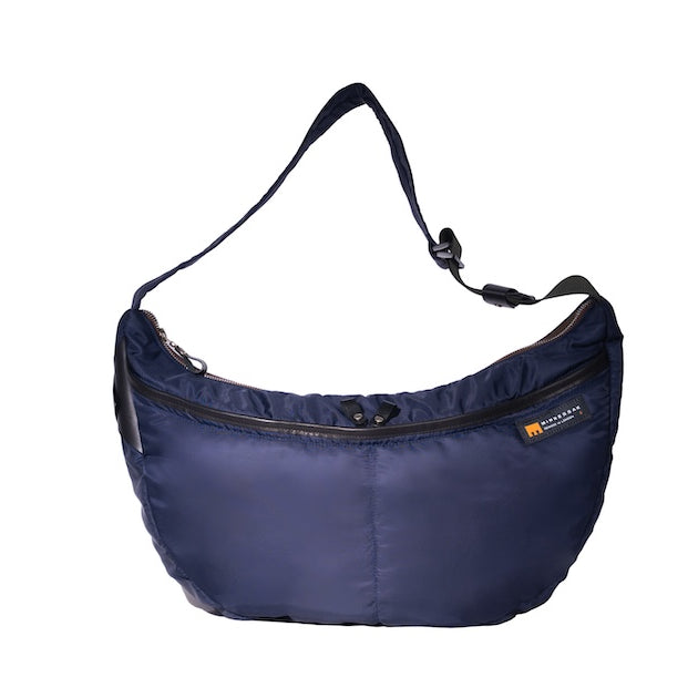 Navy Boat Large, front, sustainable crossbody bag handmade from repurposed MA-1 flight jacket material with adjustable strap and two front zip pockets.