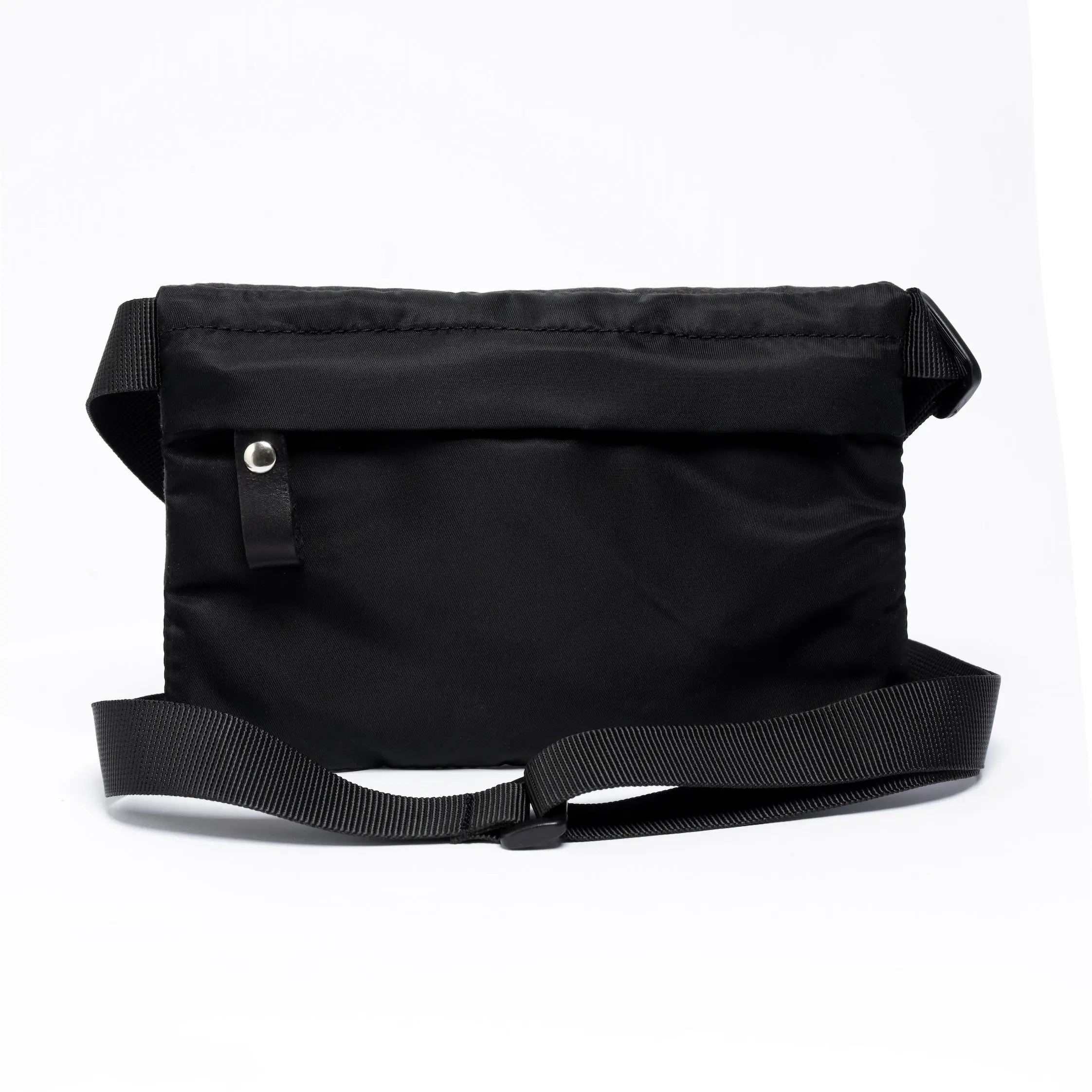 Small cross bdy bag in black on white background