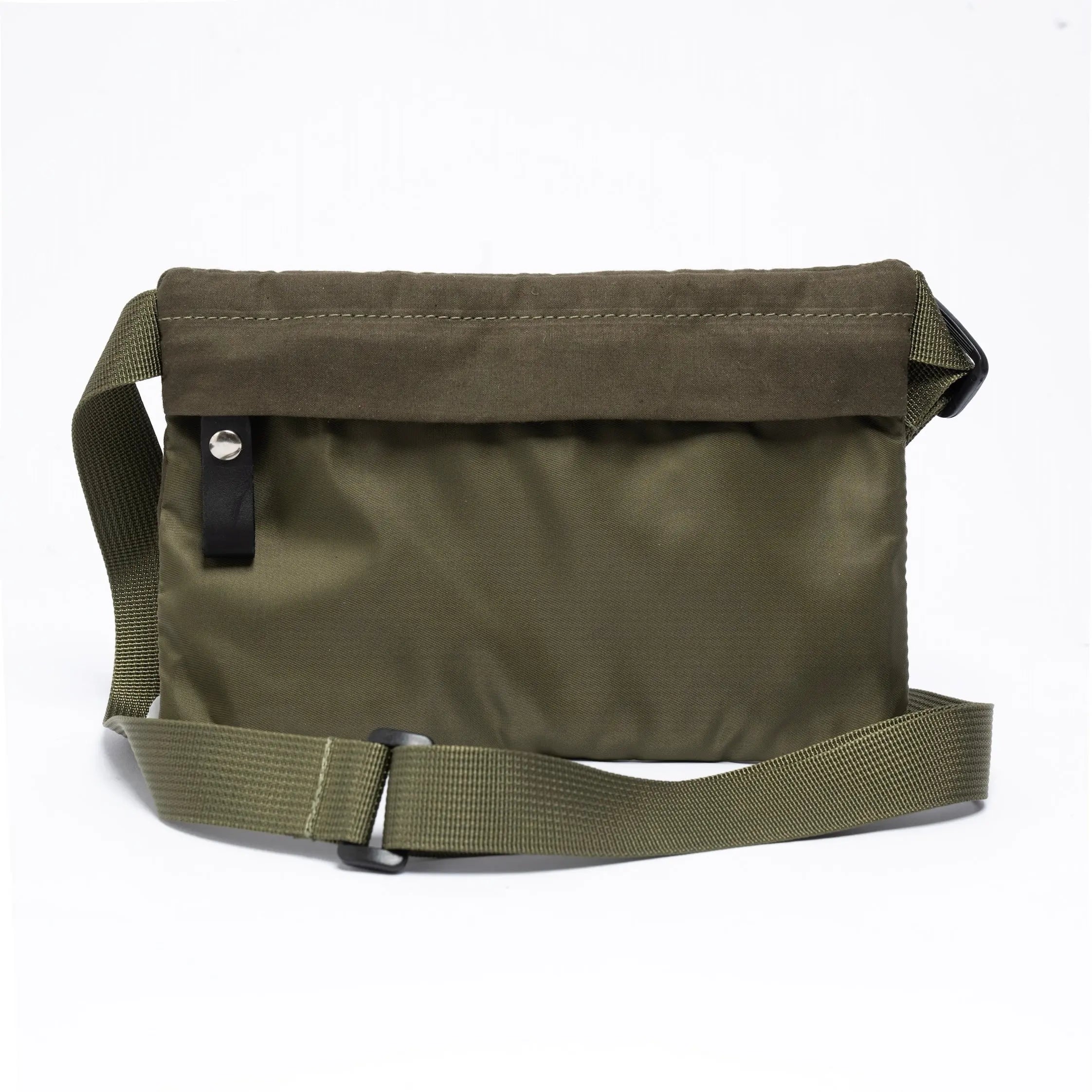 Small cross body bag in olive on a white background