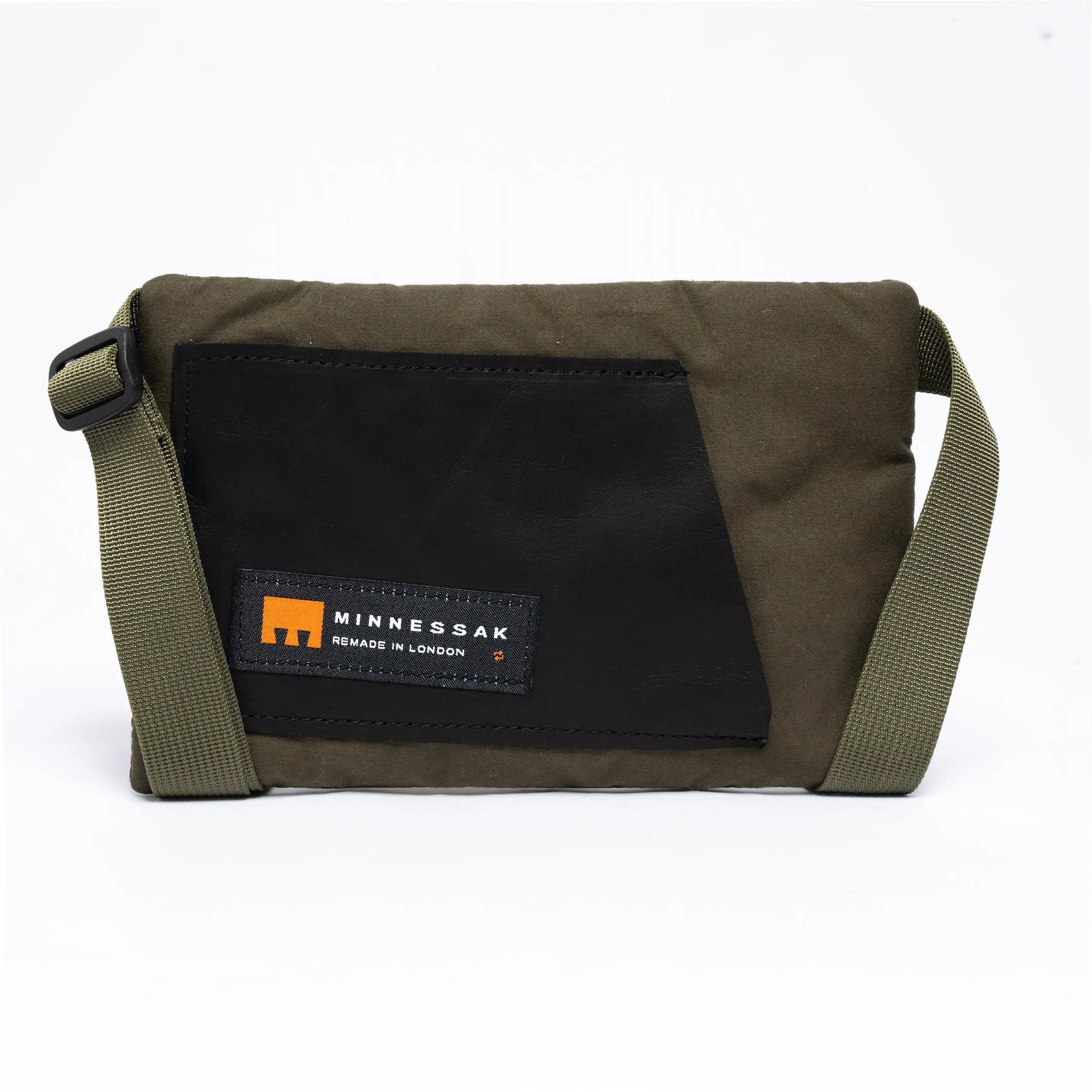 Olive small crossbody bag with MInnessak logo on a white background