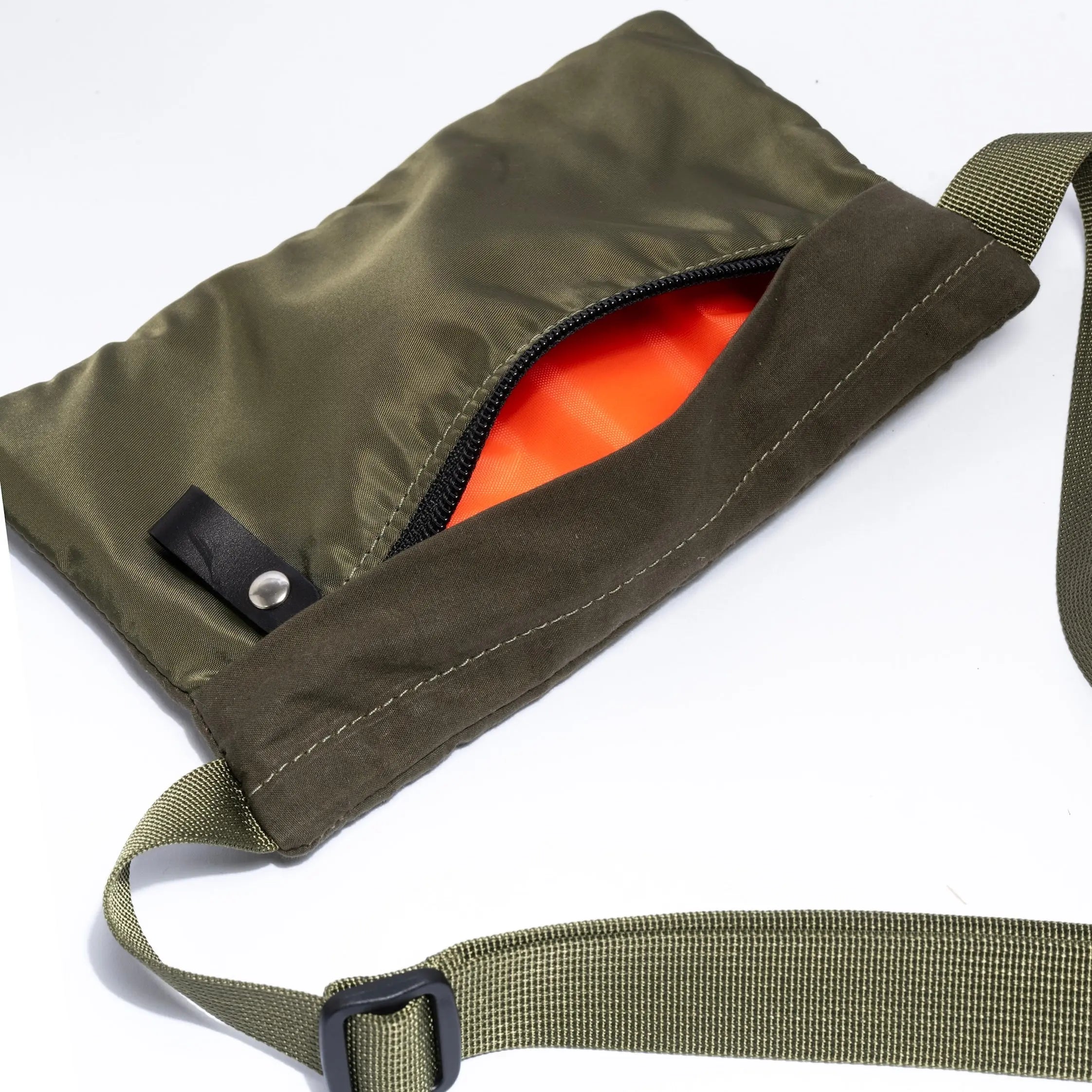 Small cross body bag in Olive on a white background