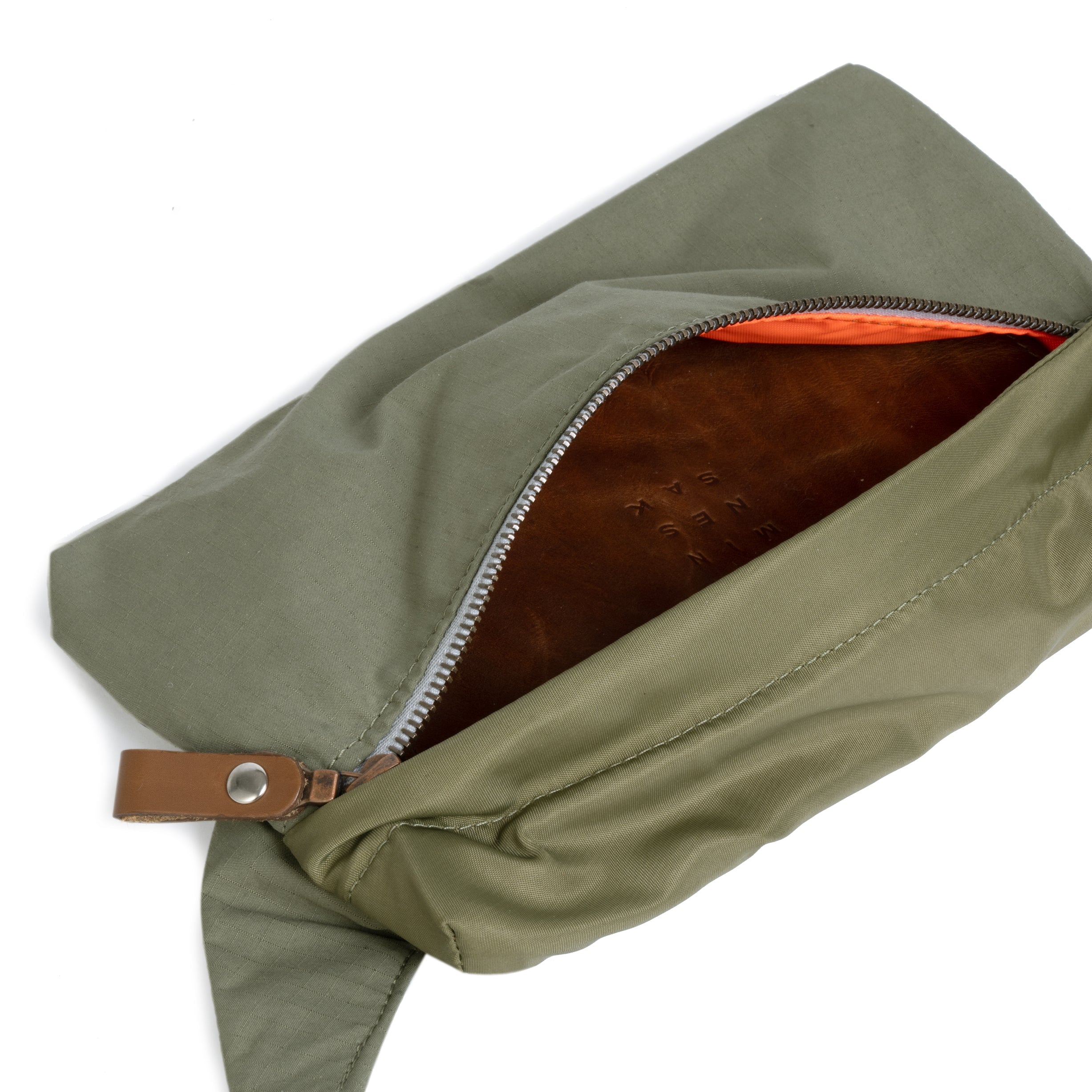 Olive pouch with a brown interior and zipper on a white background