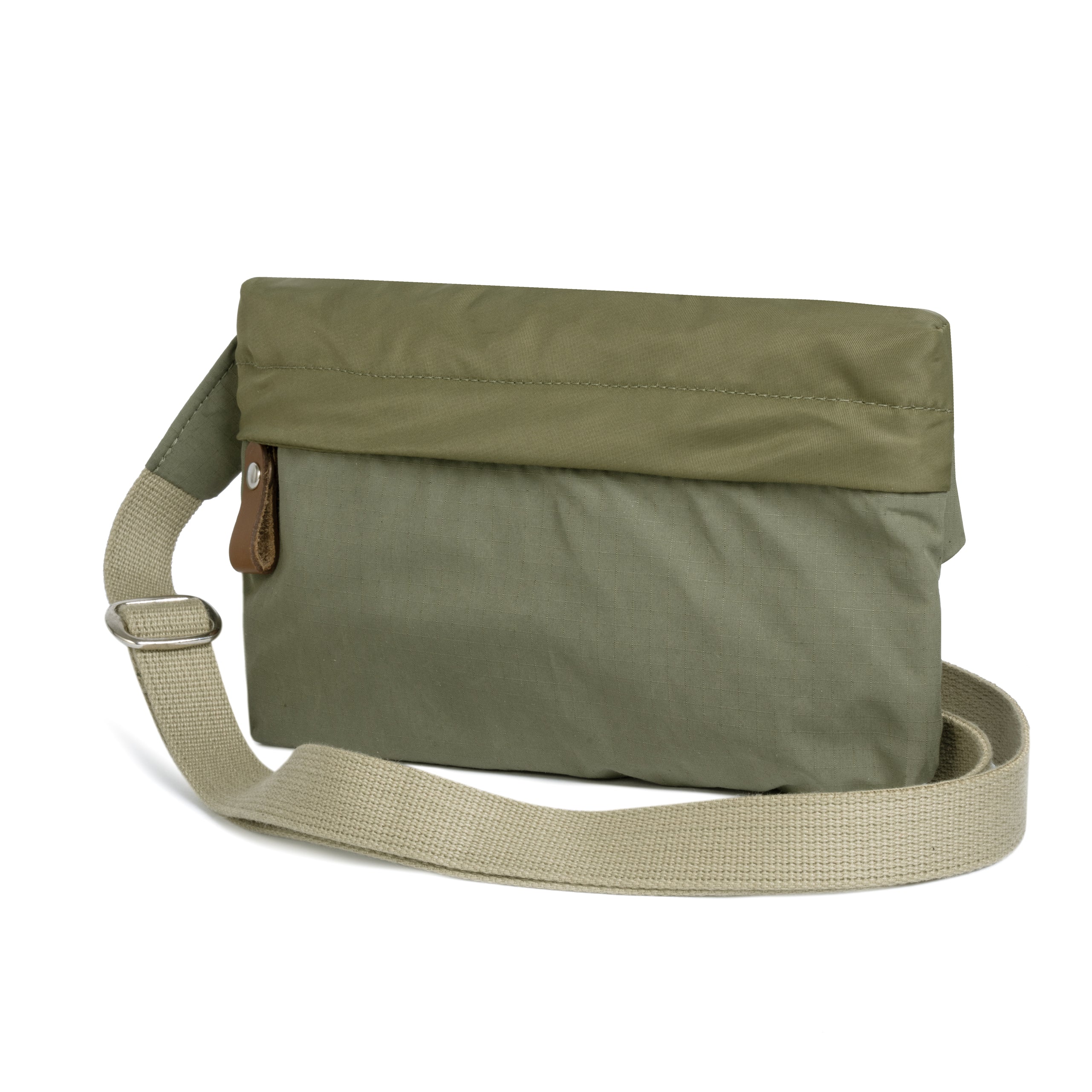 Olive shoulder bag with a strap on a white background