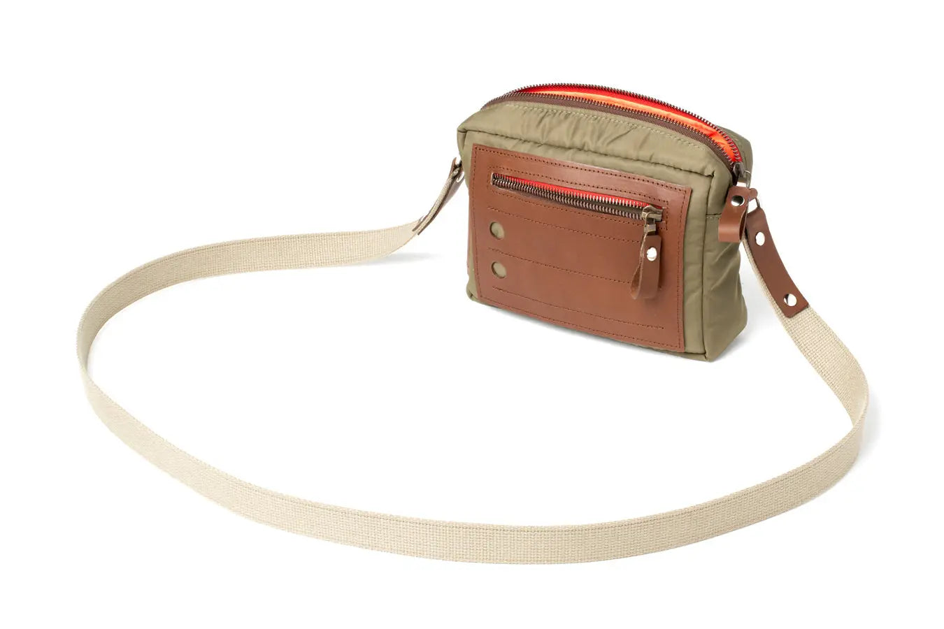 Crossbody bag with a mix of brown and beige colors on a white background