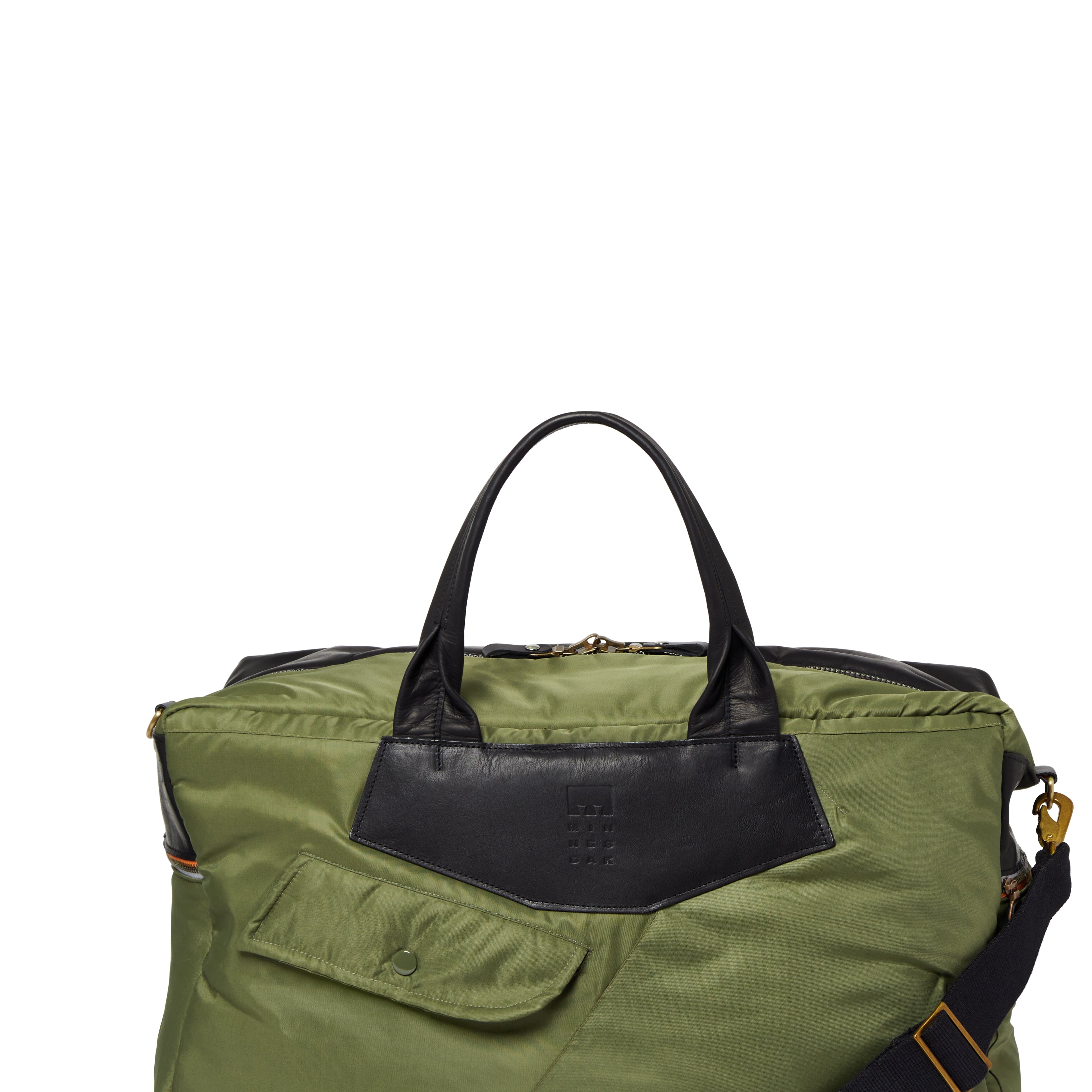 Olive with black accents on a white background