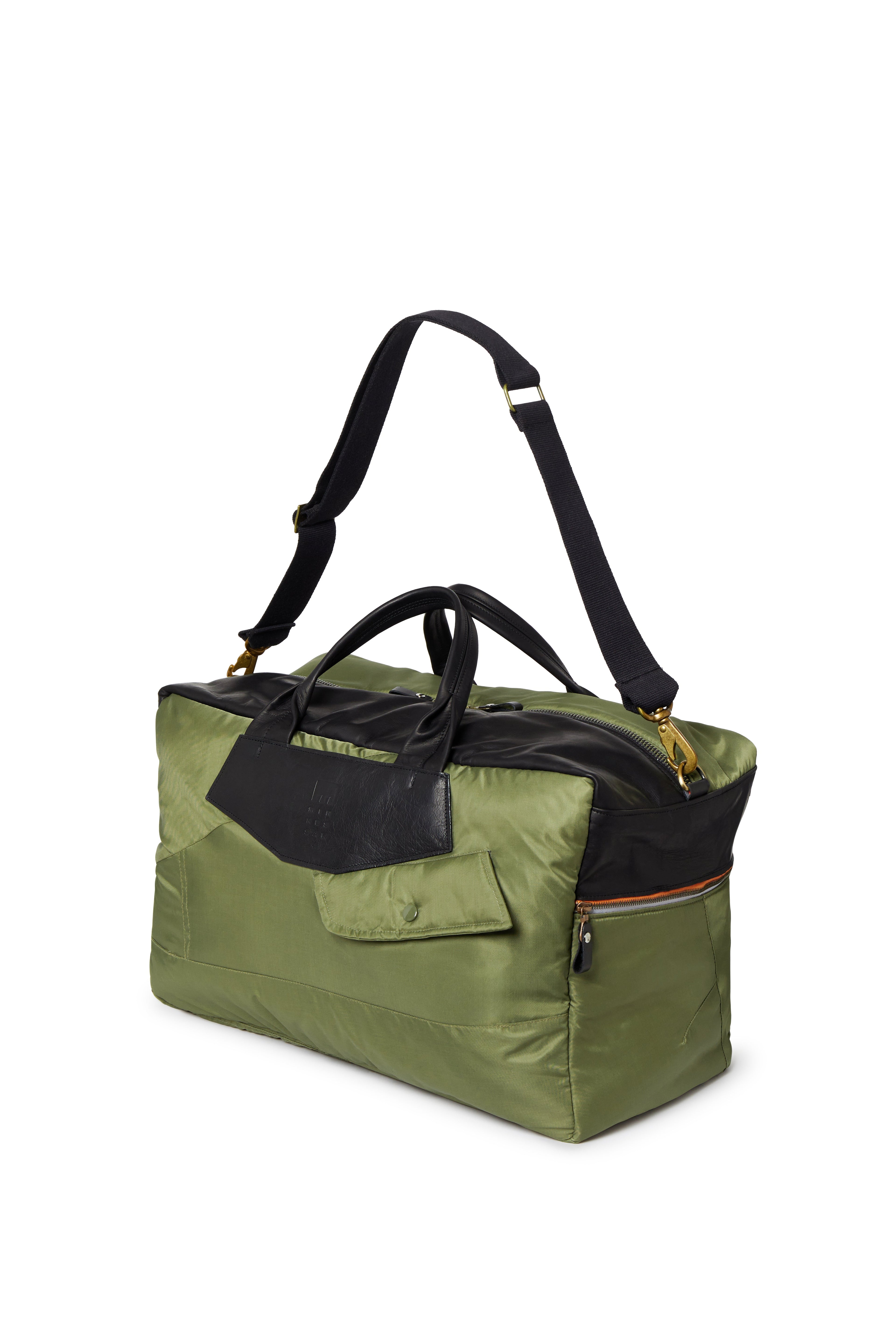 Olive with black accents with a strap on a white background