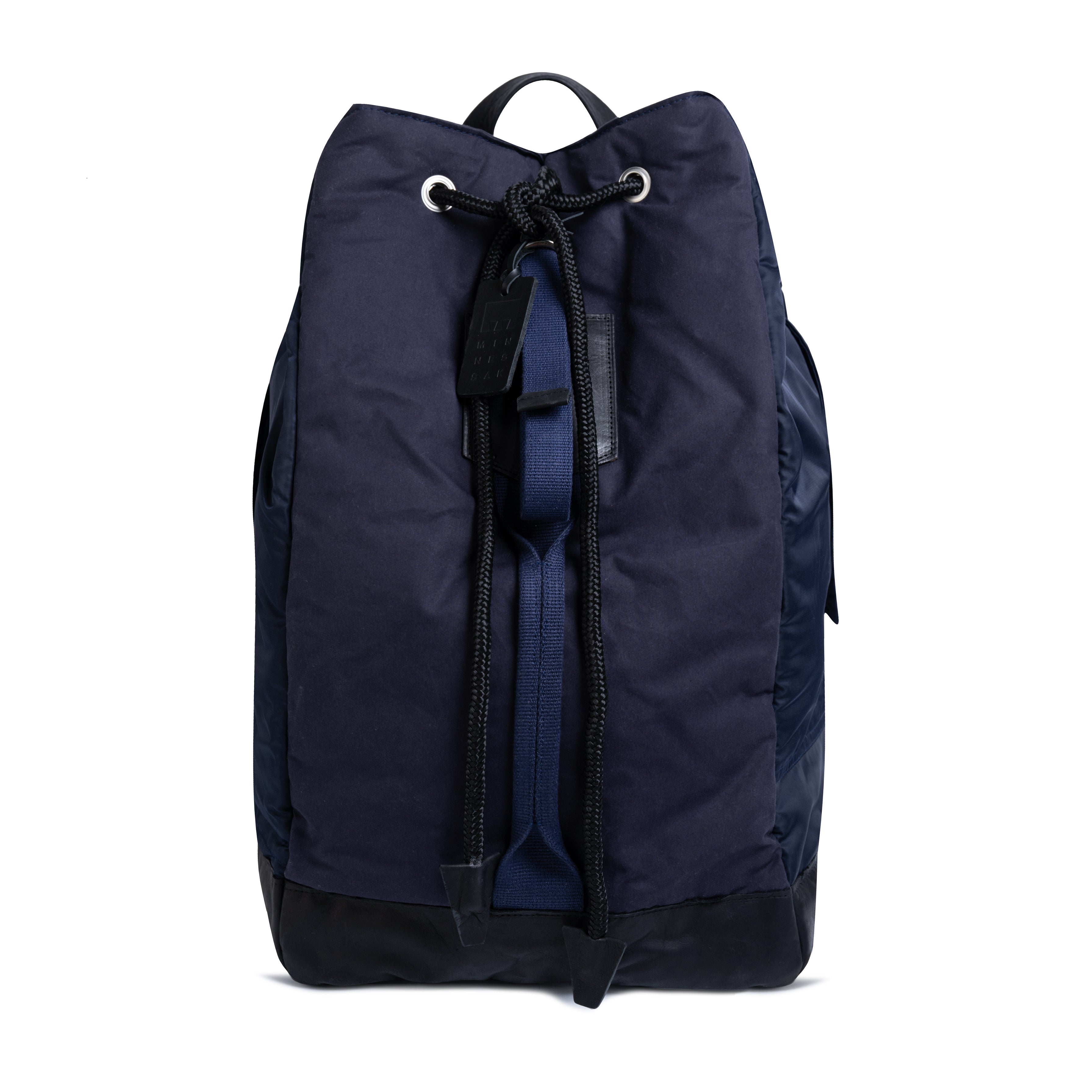 Navy blue backpack with a drawstring on a white background