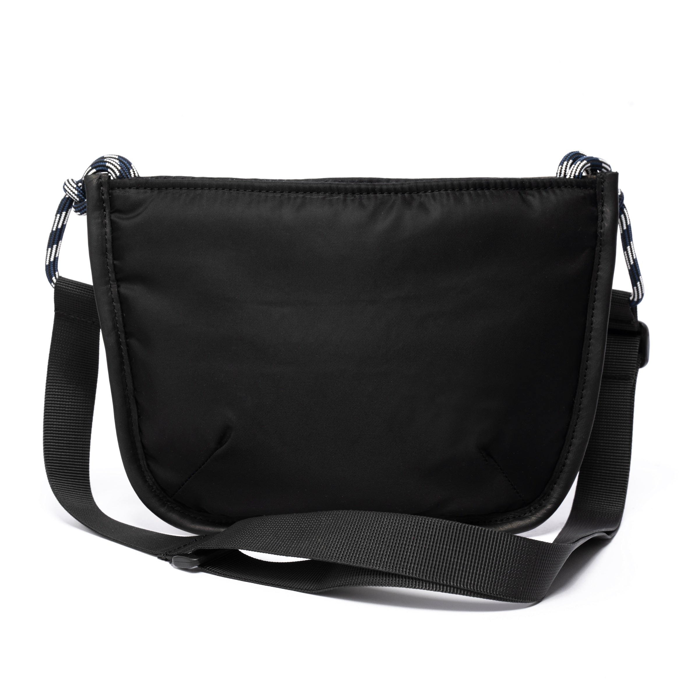 Black shoulder/cross body bag with strap on white background
