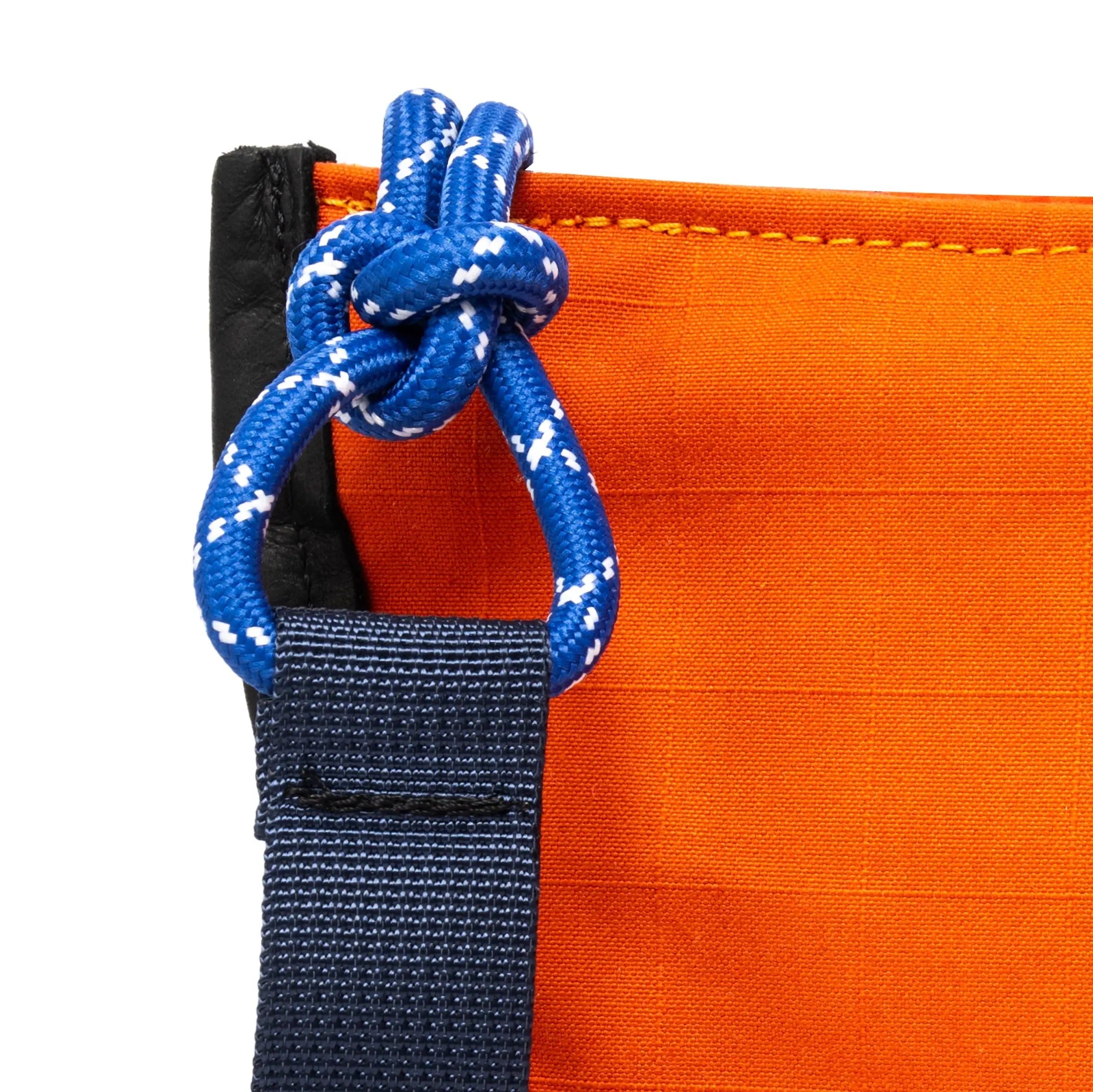 Navy & Orange shoulder/cross body bag showing strap detail on white background