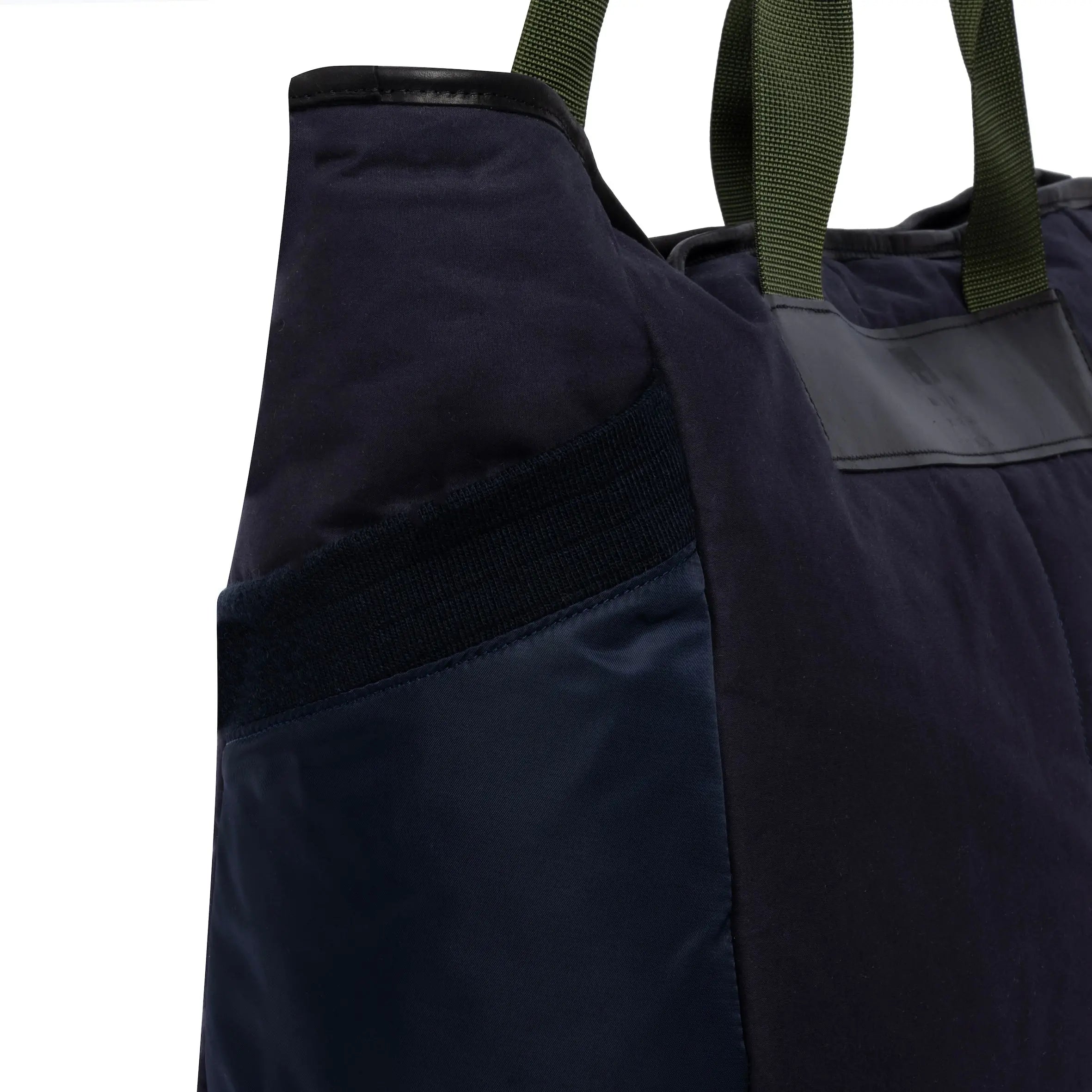 Large navy tote bag pocket detail on white background