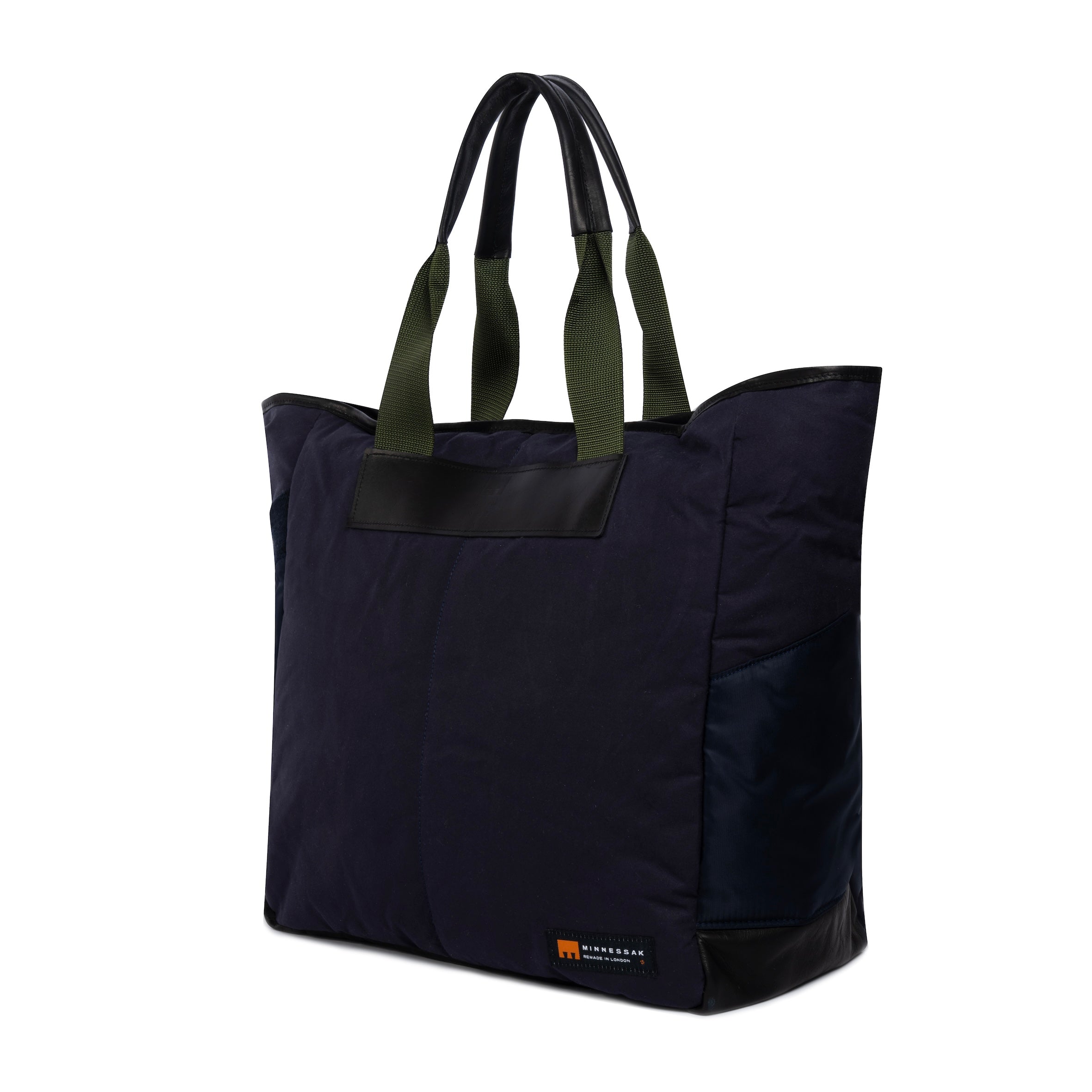 Large navy tote bag side view on white background