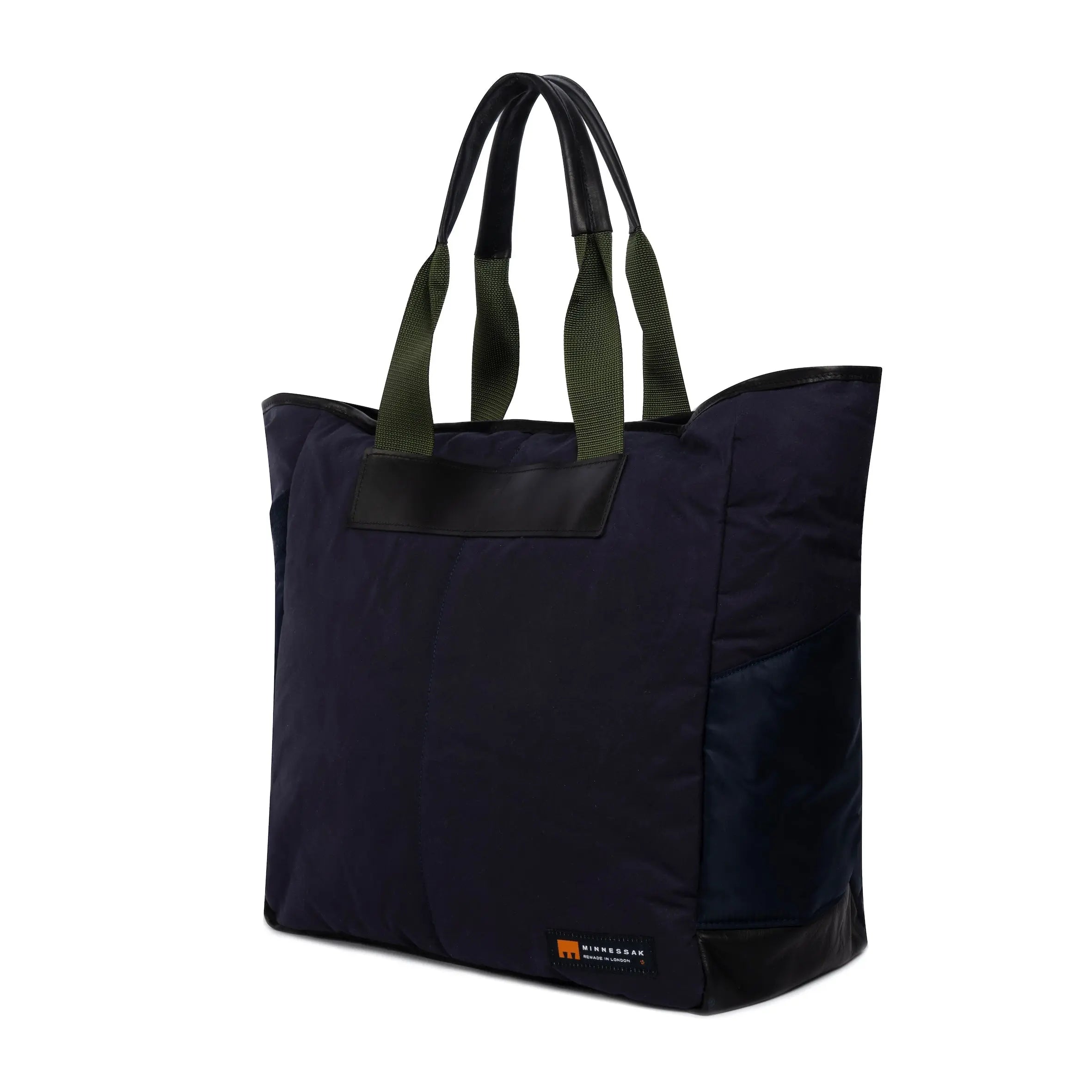 Large navy tote bag side view on white background