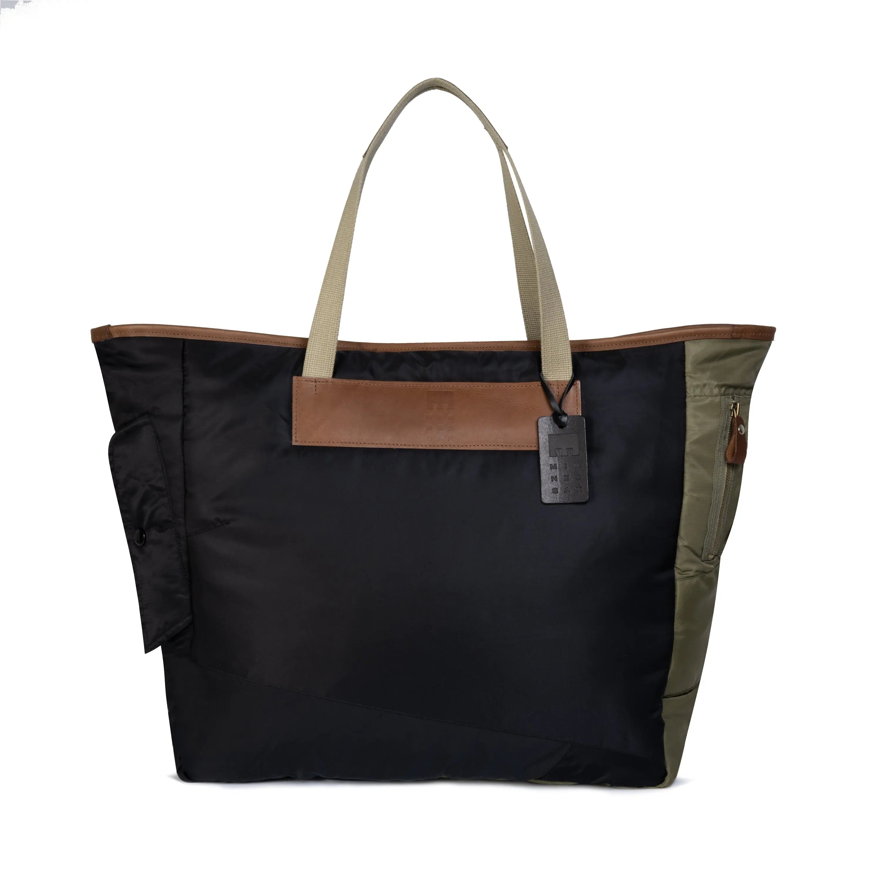 Black tote bag with brown and olive accents on a white background