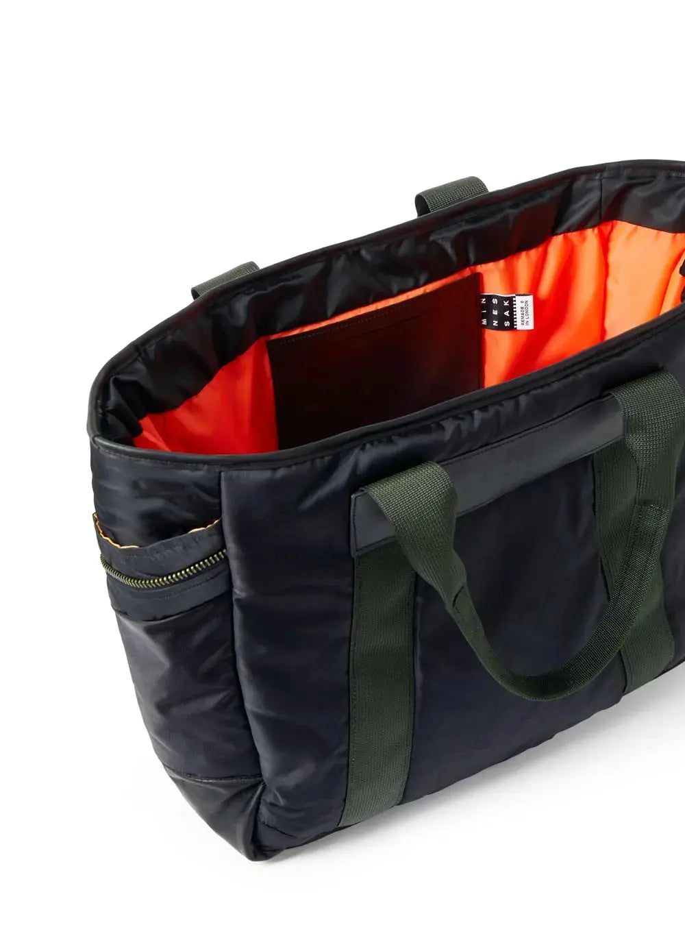 Black and green bag with orange interior on a white background