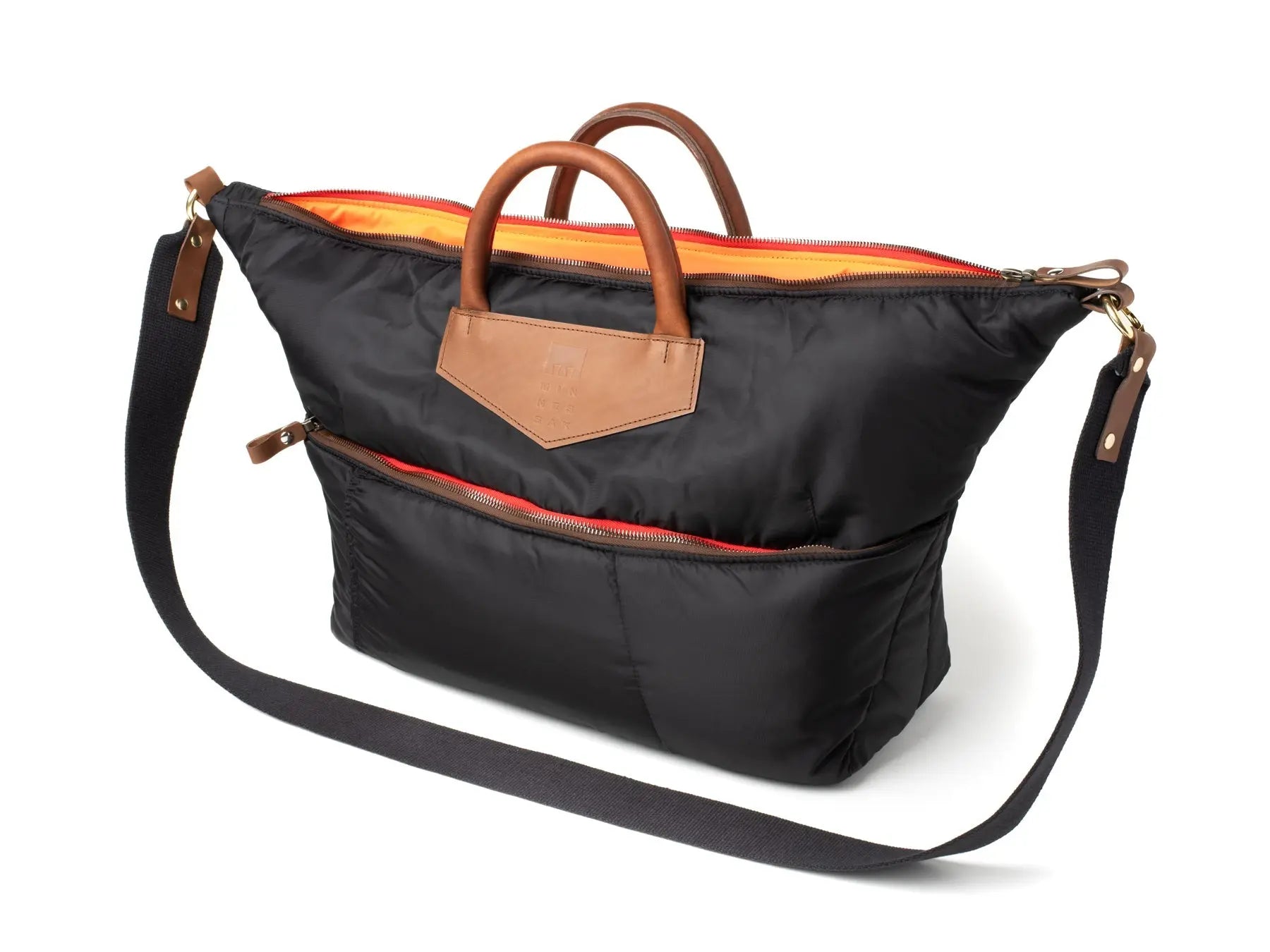 Black bag with brown handles and orange interior on a white background