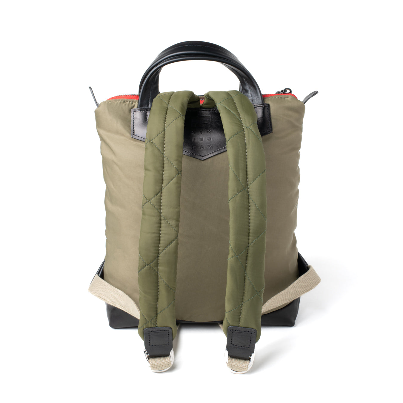 Backpack with quilted green back panel on a white background