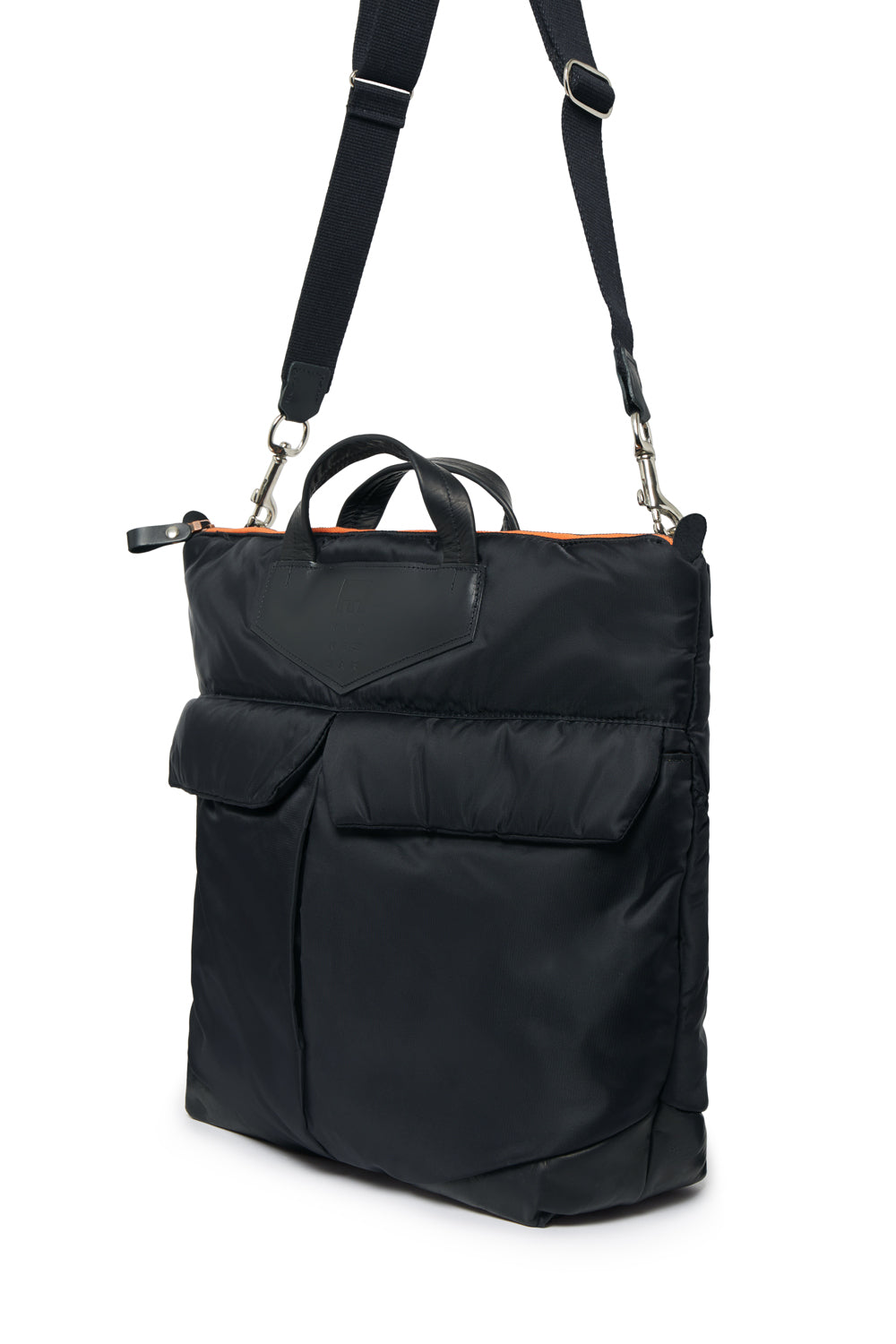 Black backpack with a strap on a white background