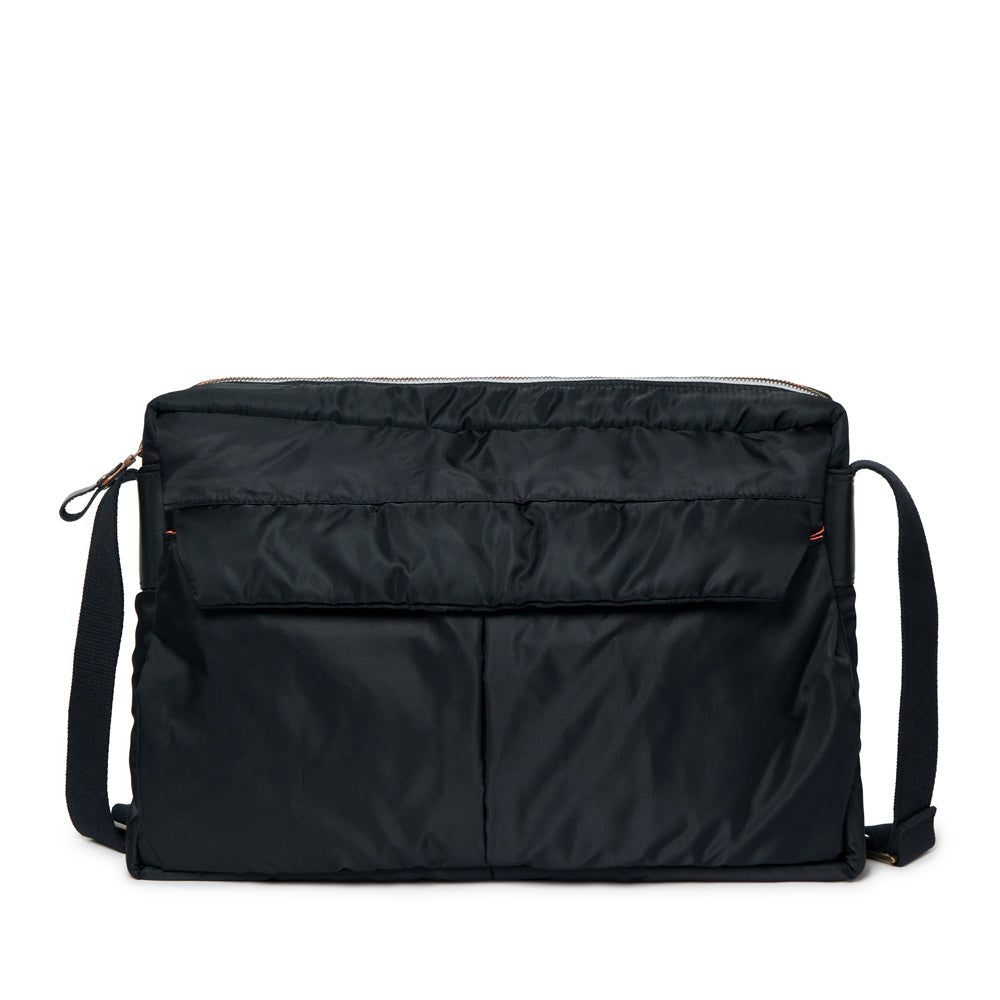 Black bag with a shoulder strap on a white background