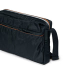 Black bag with orange zipper on a white background