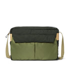 Green and gray bag with a beige strap on a white background