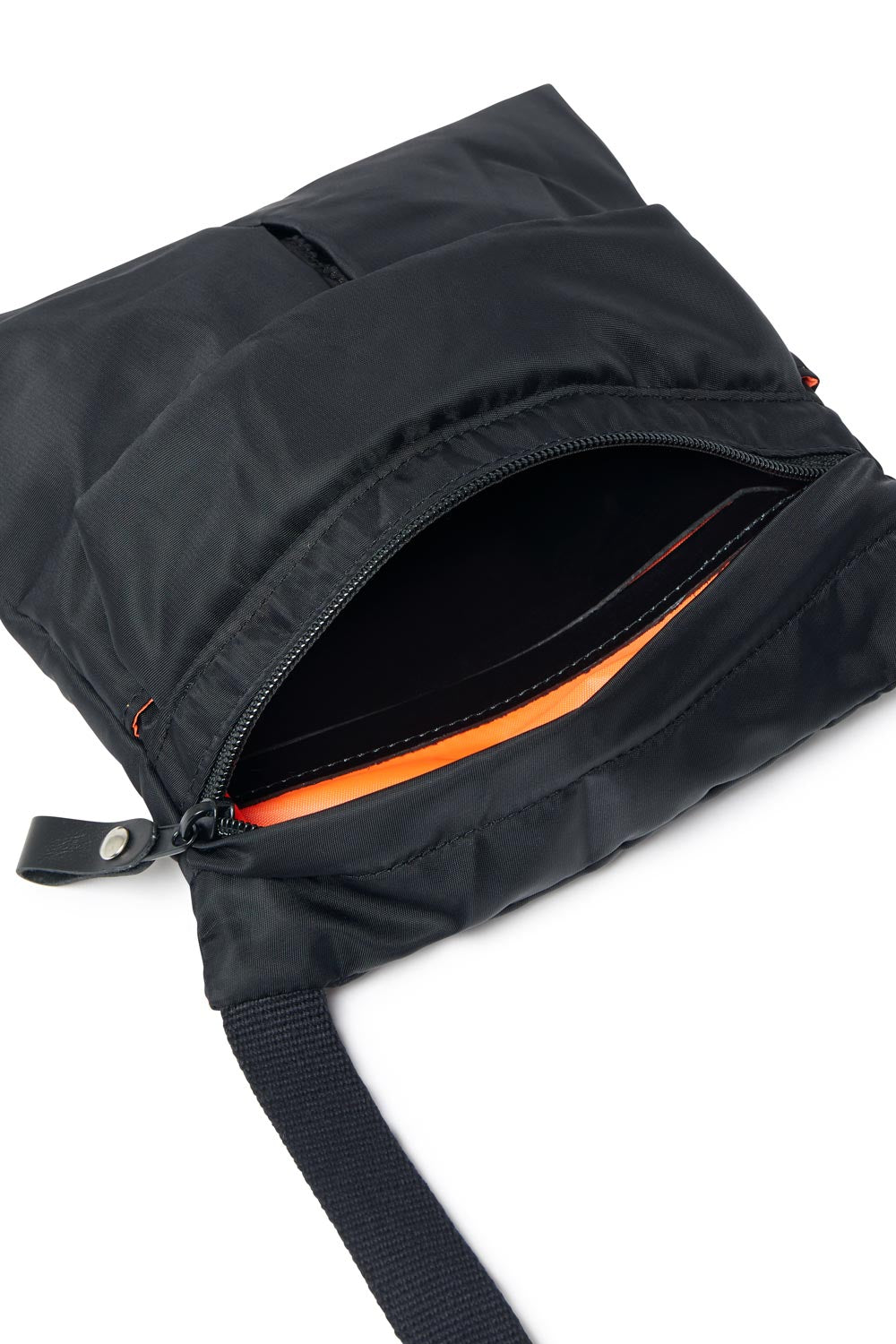 Black bag with orange interior on a white background